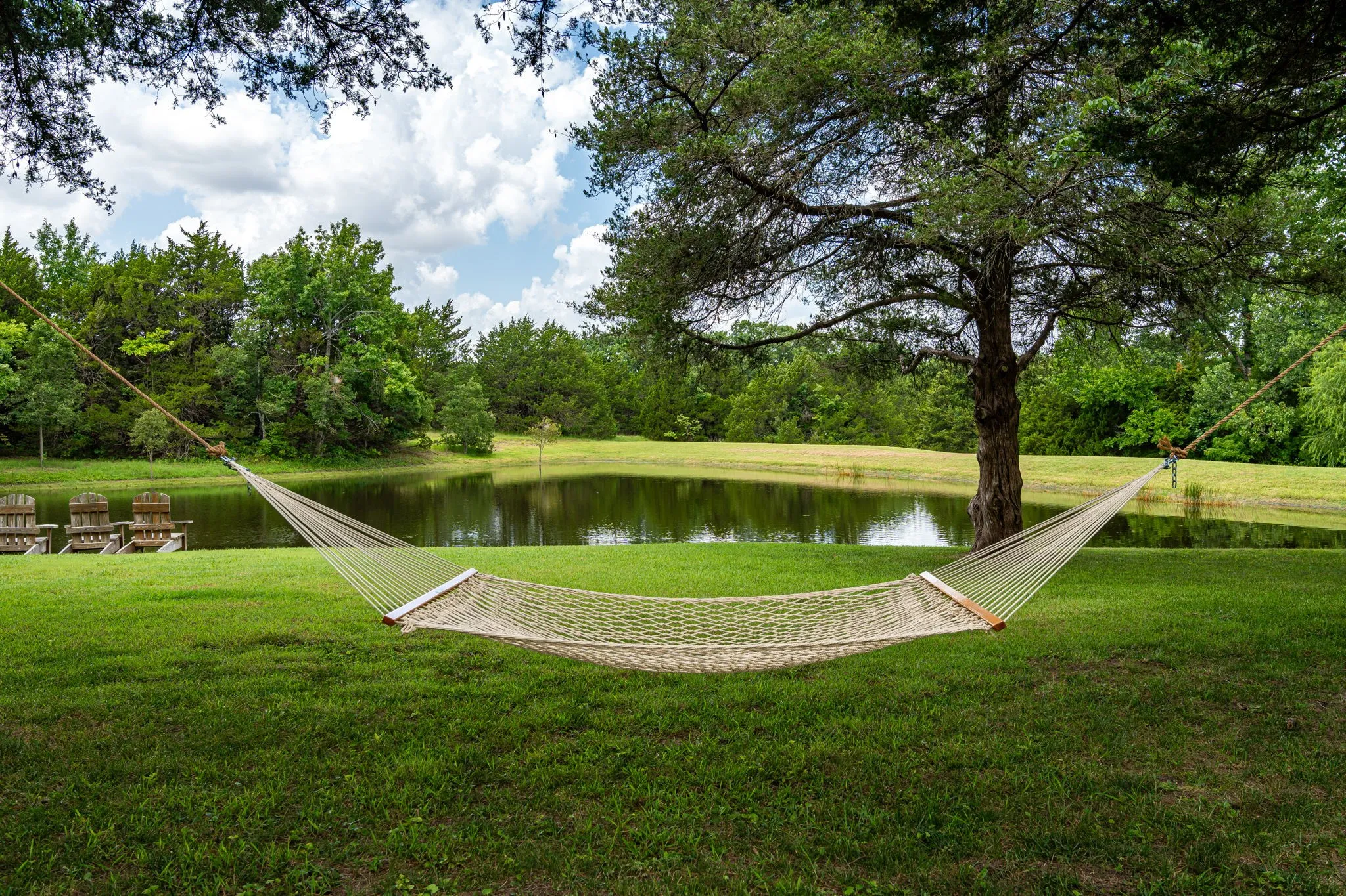 The perfect setting to stretch out in a hammock by the pond and melt into a novel.