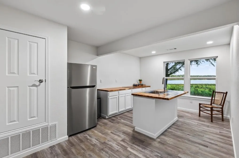 Guest house kitchenette includes sink, and two burners