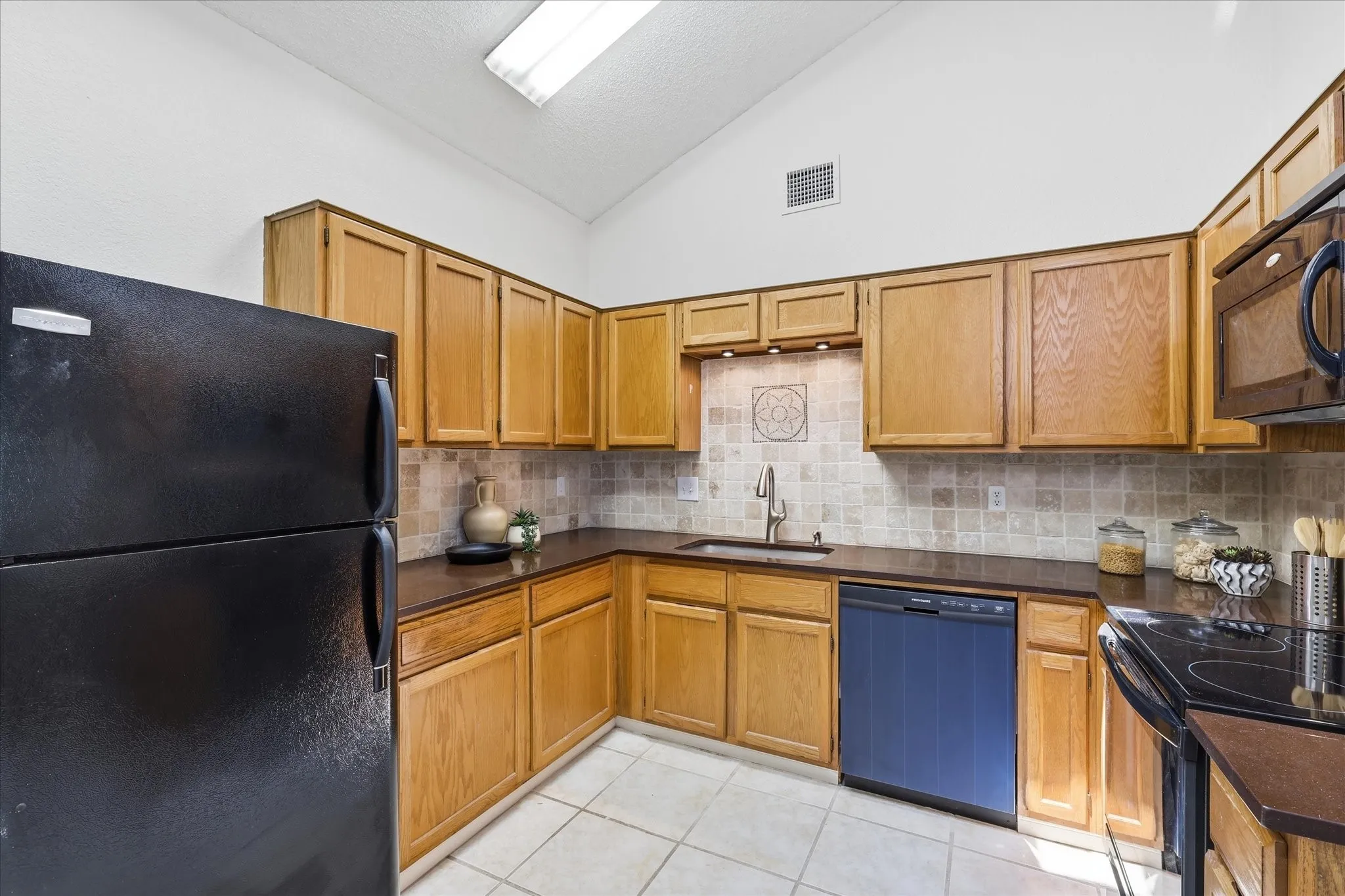 Roomy kitchen with brand new dishwasher and included fridge
