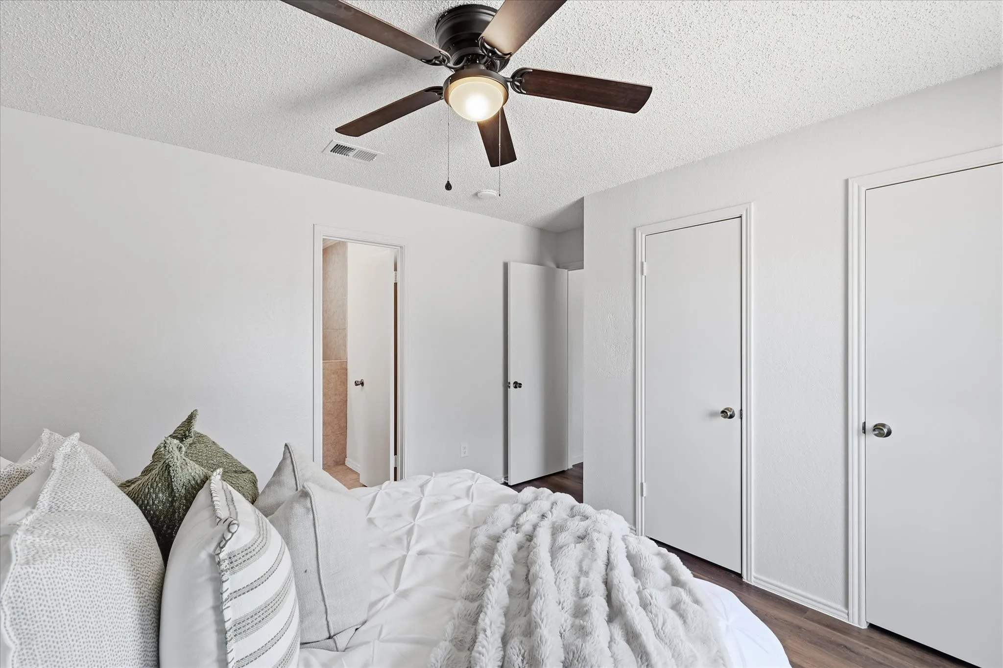 Double closet in primary bedroom