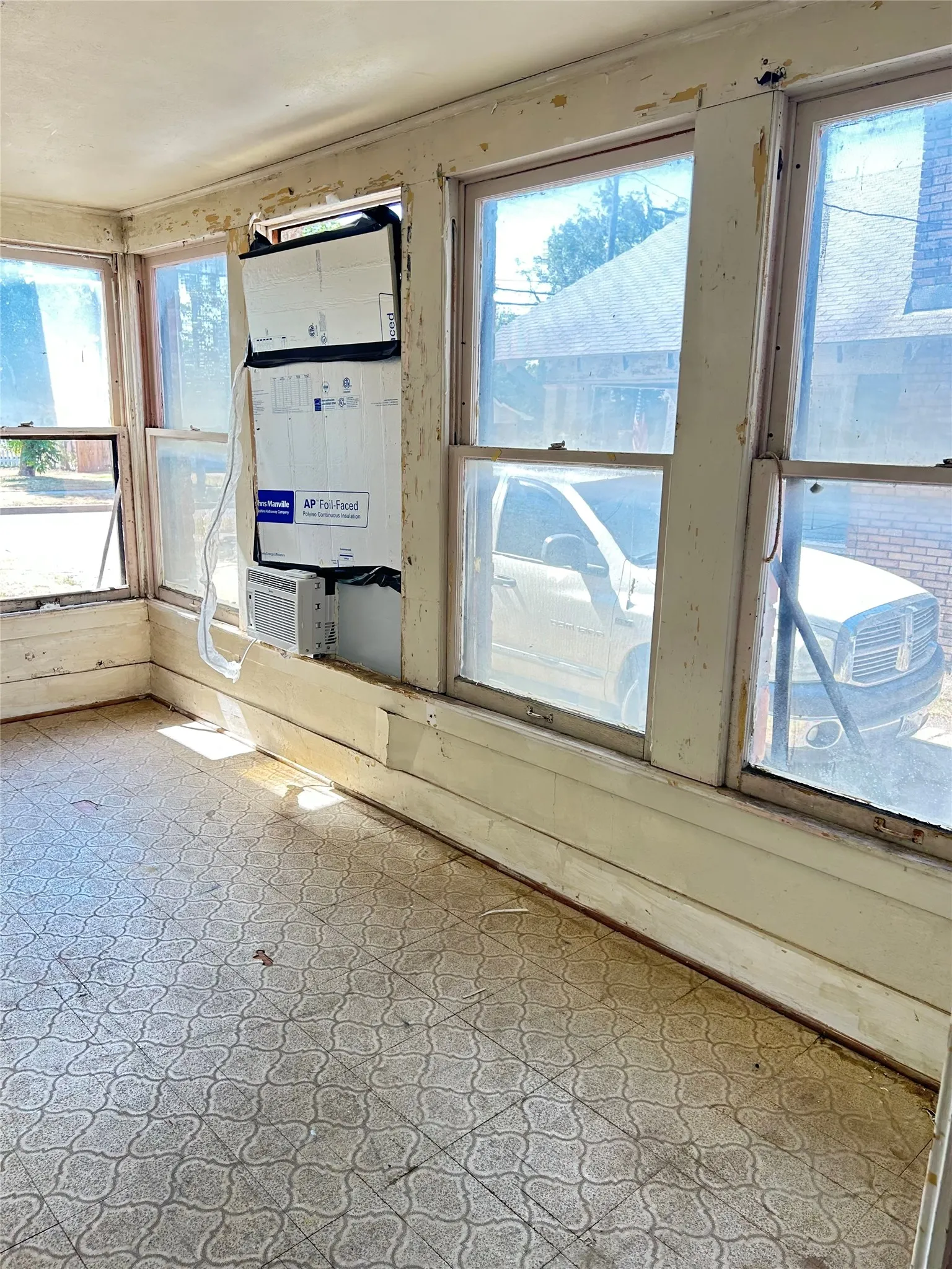 A bank of windows to allow lots of natural light in. So many possibilities for this room.
