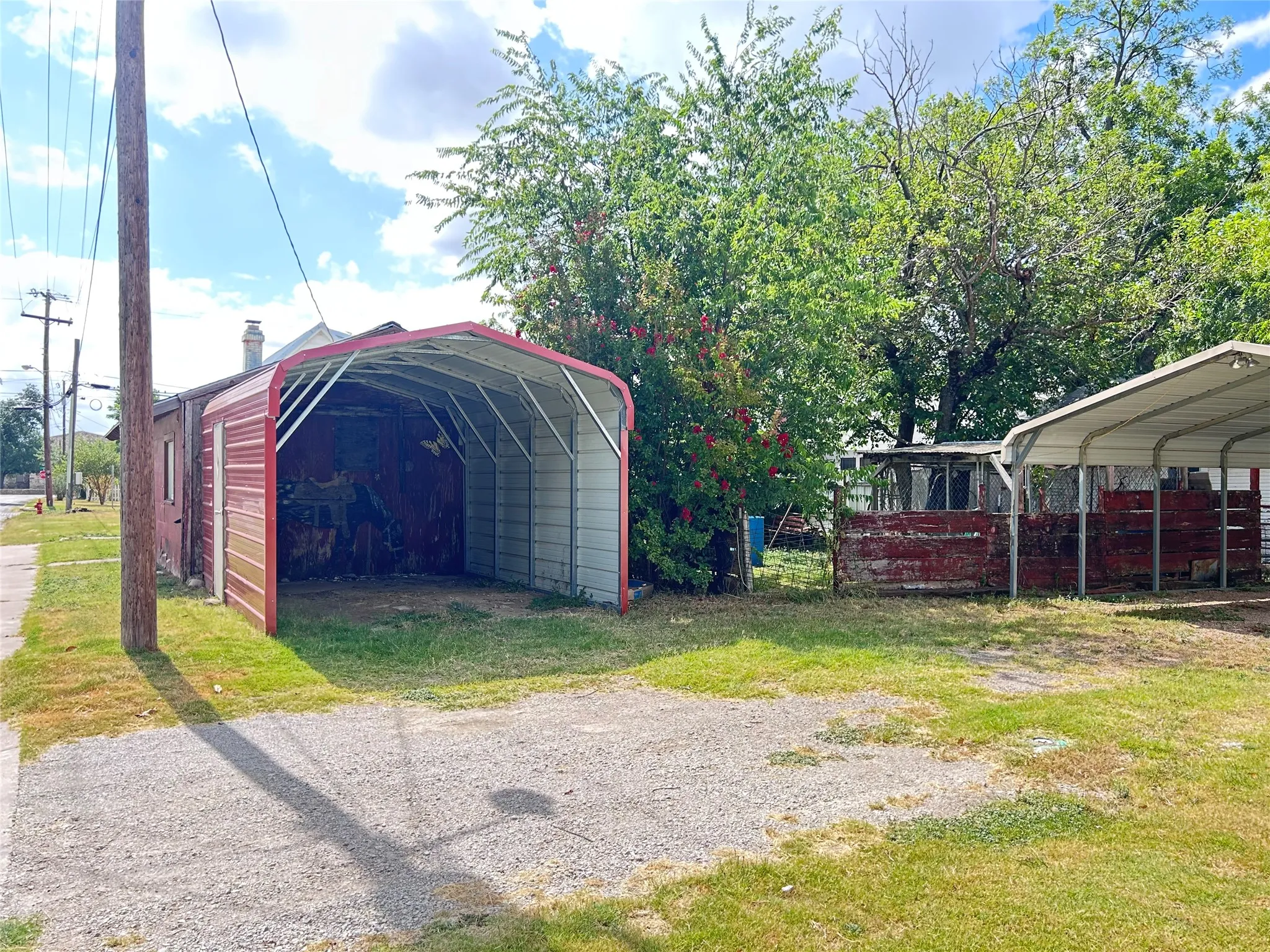  Here is another covered parking spot or storage area for your belongings that is protected from the elements.