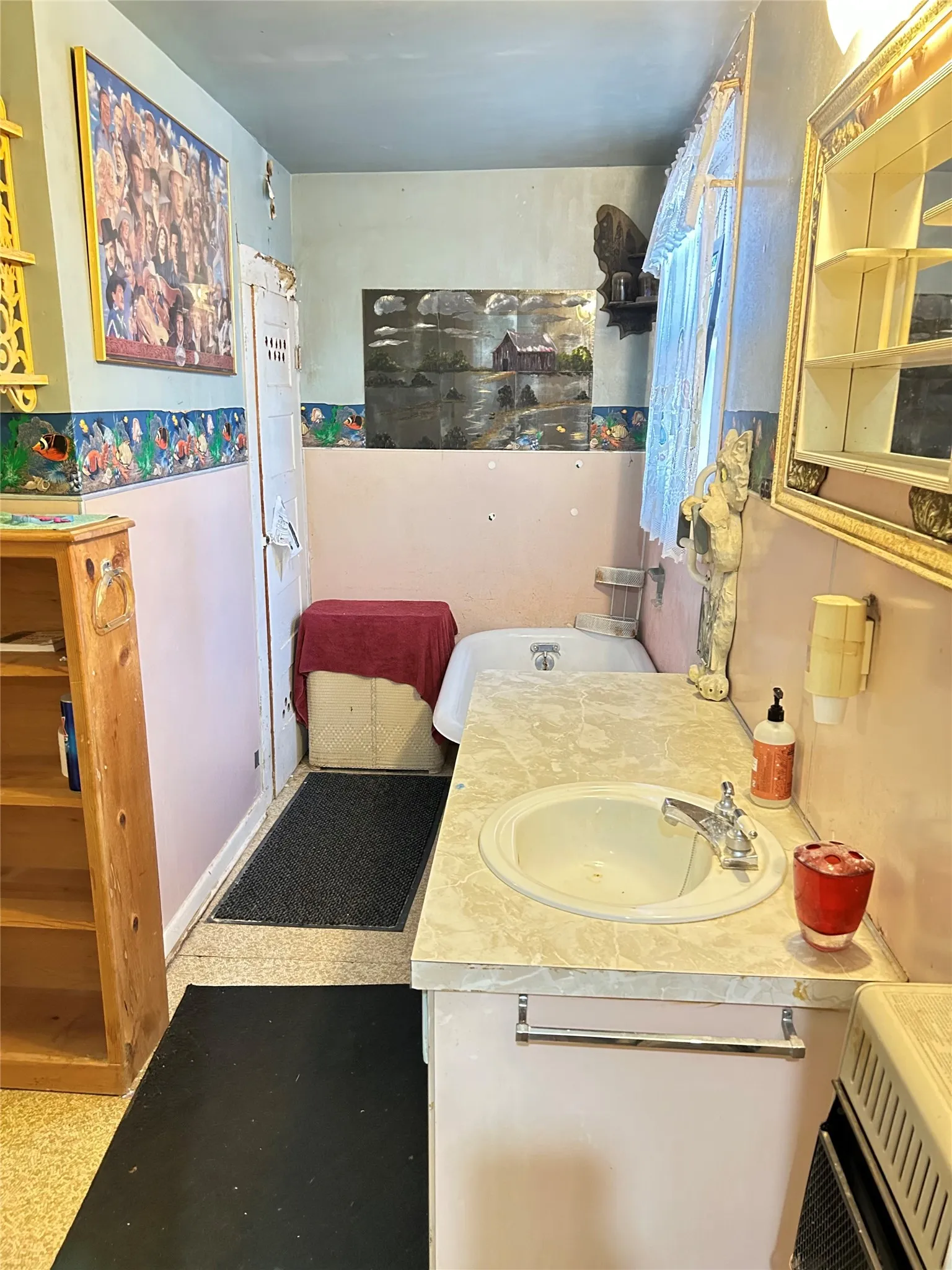 Bathroom with lovely wallpaper, vinyl flooring, a window, and shelving. There is also a linen closet.