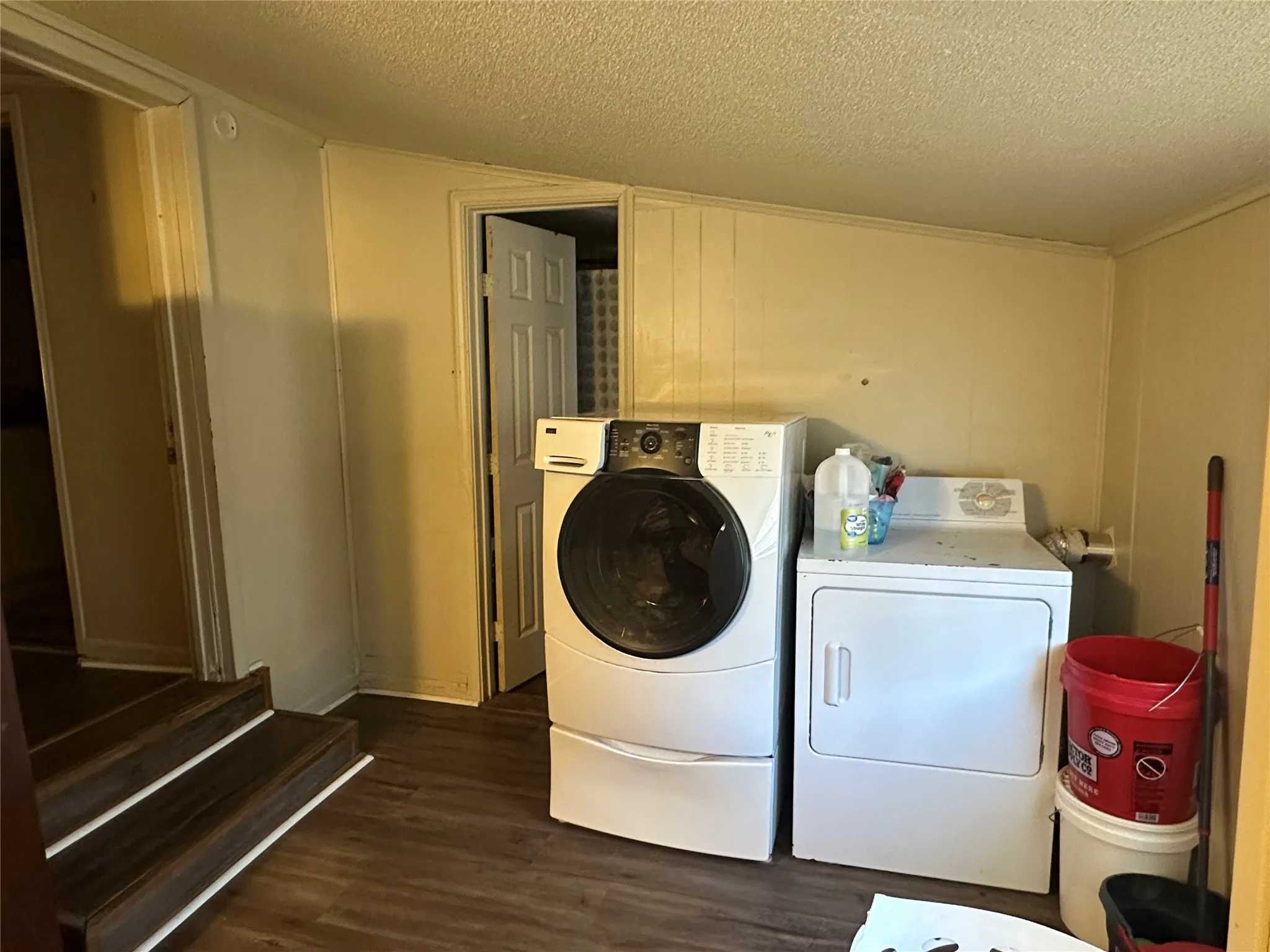 Dedicated laundry area off enclosed back porch