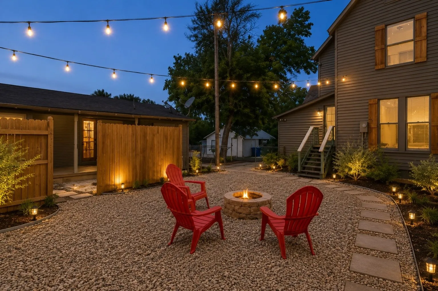Gravel hardscaping featuring a stone fire pit
AI generated, gravel work to be completed