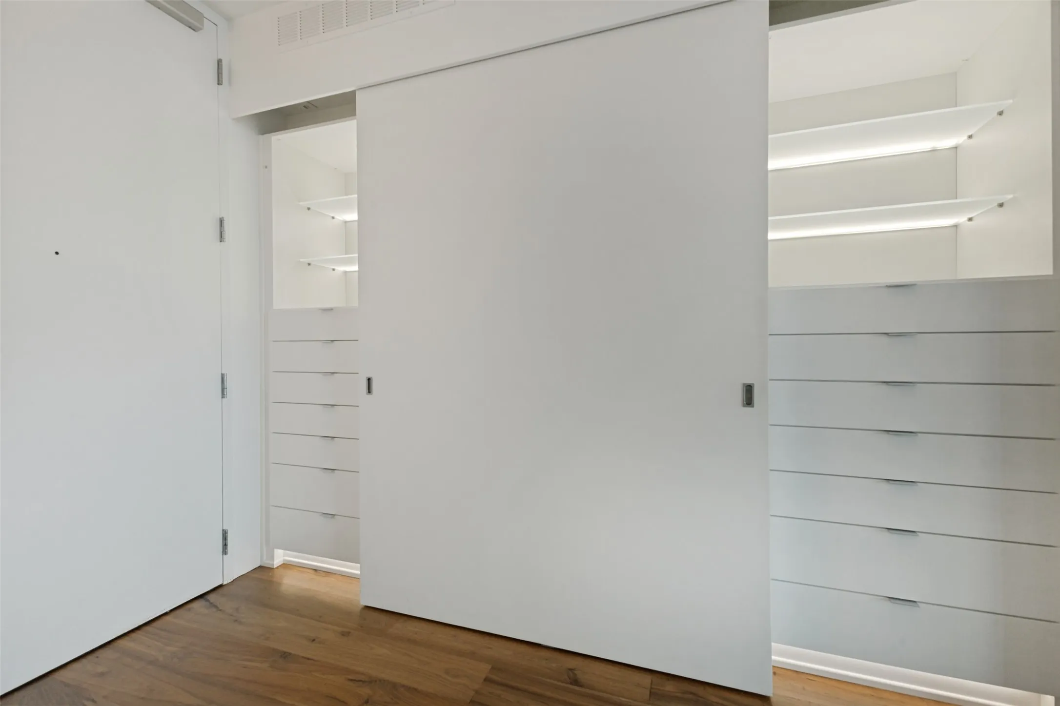 Custom closet and storage in entry hallway