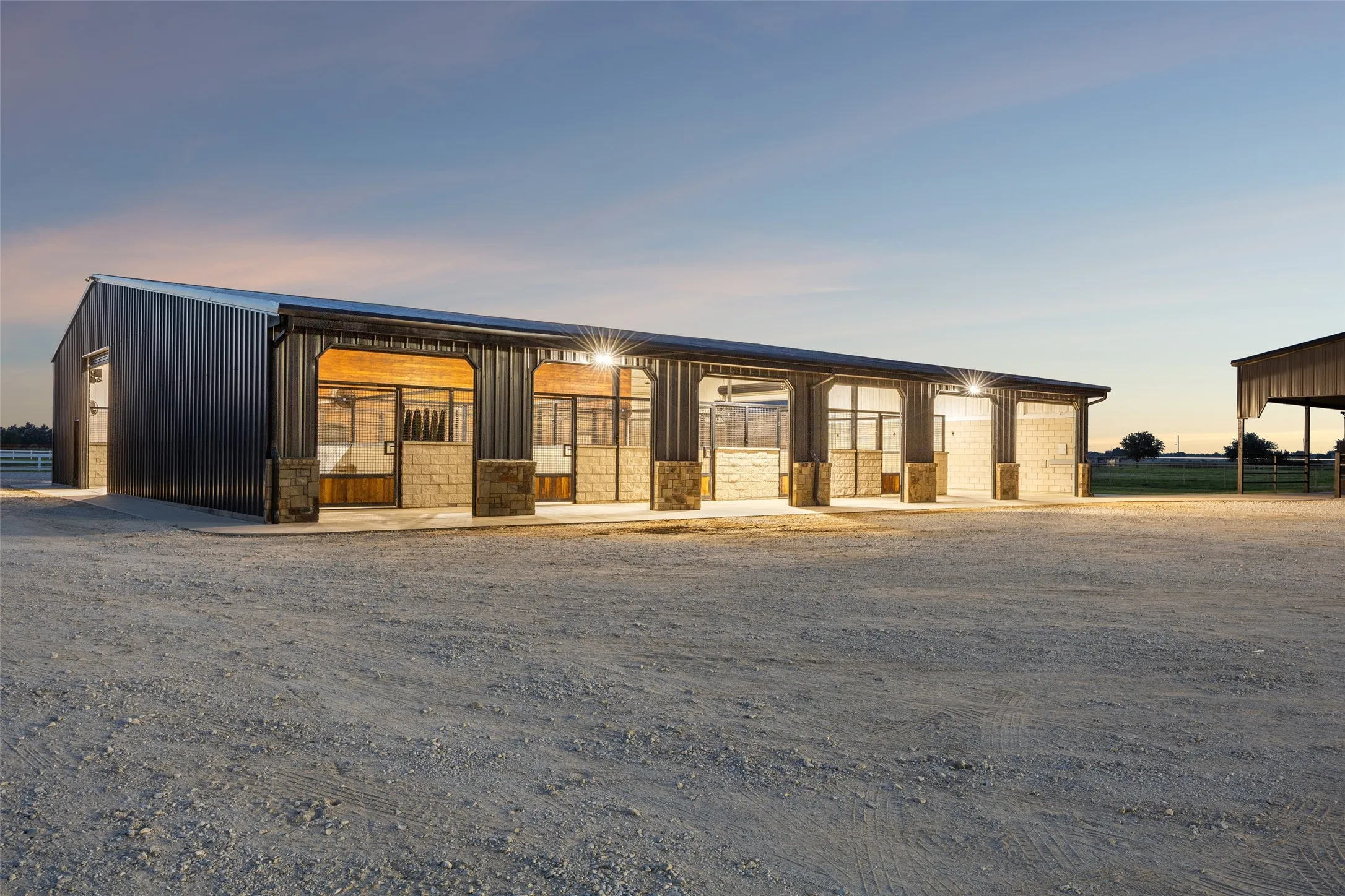 Back of barn offering great airflow with 6 insulated high bay doors.