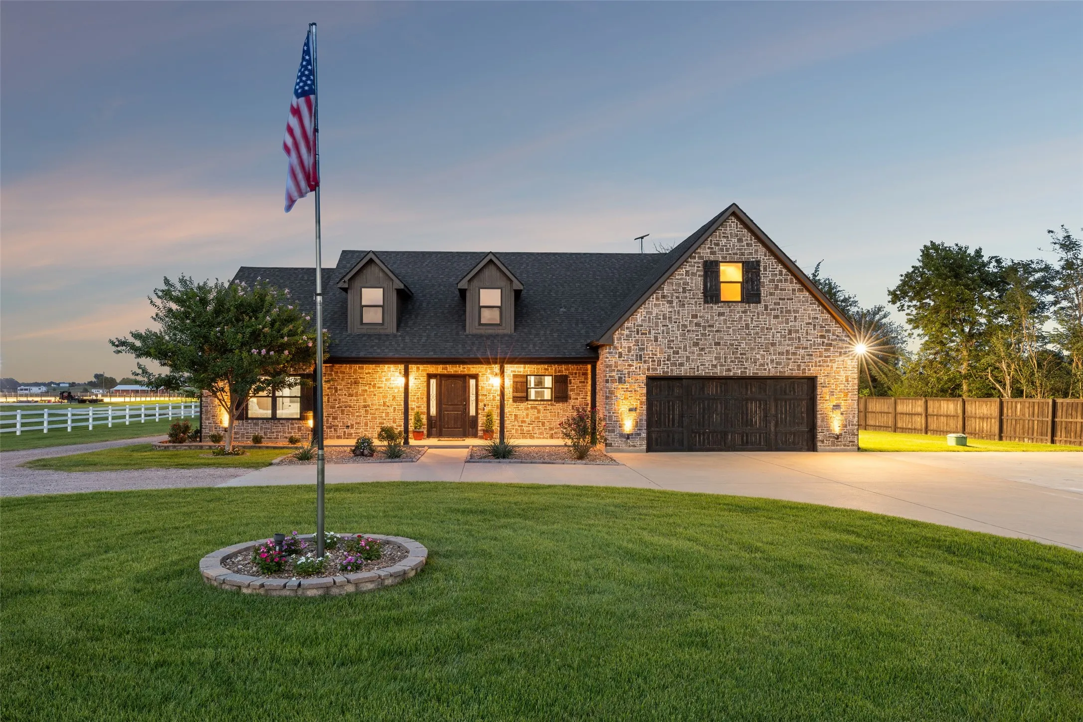 Charming home with circle drive and extra parking or basketball court.