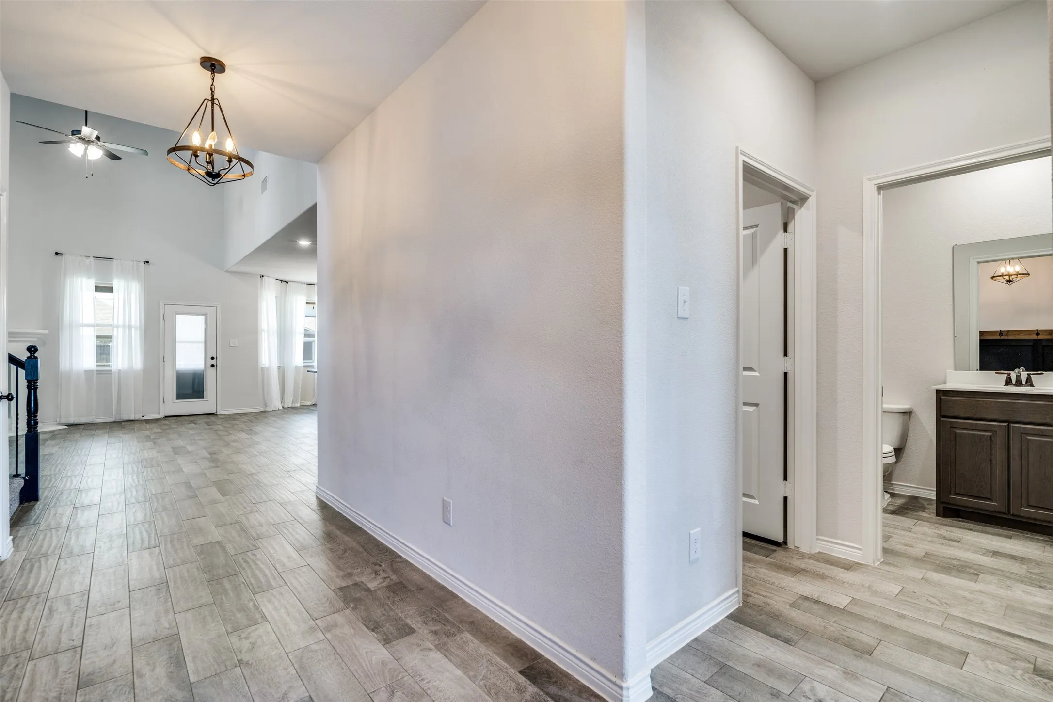 Separate bedroom/office, full bath and utility room off of entry