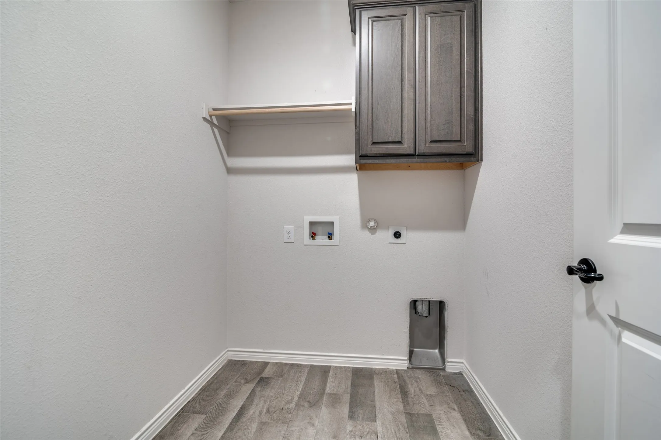 Large utility room with storage.