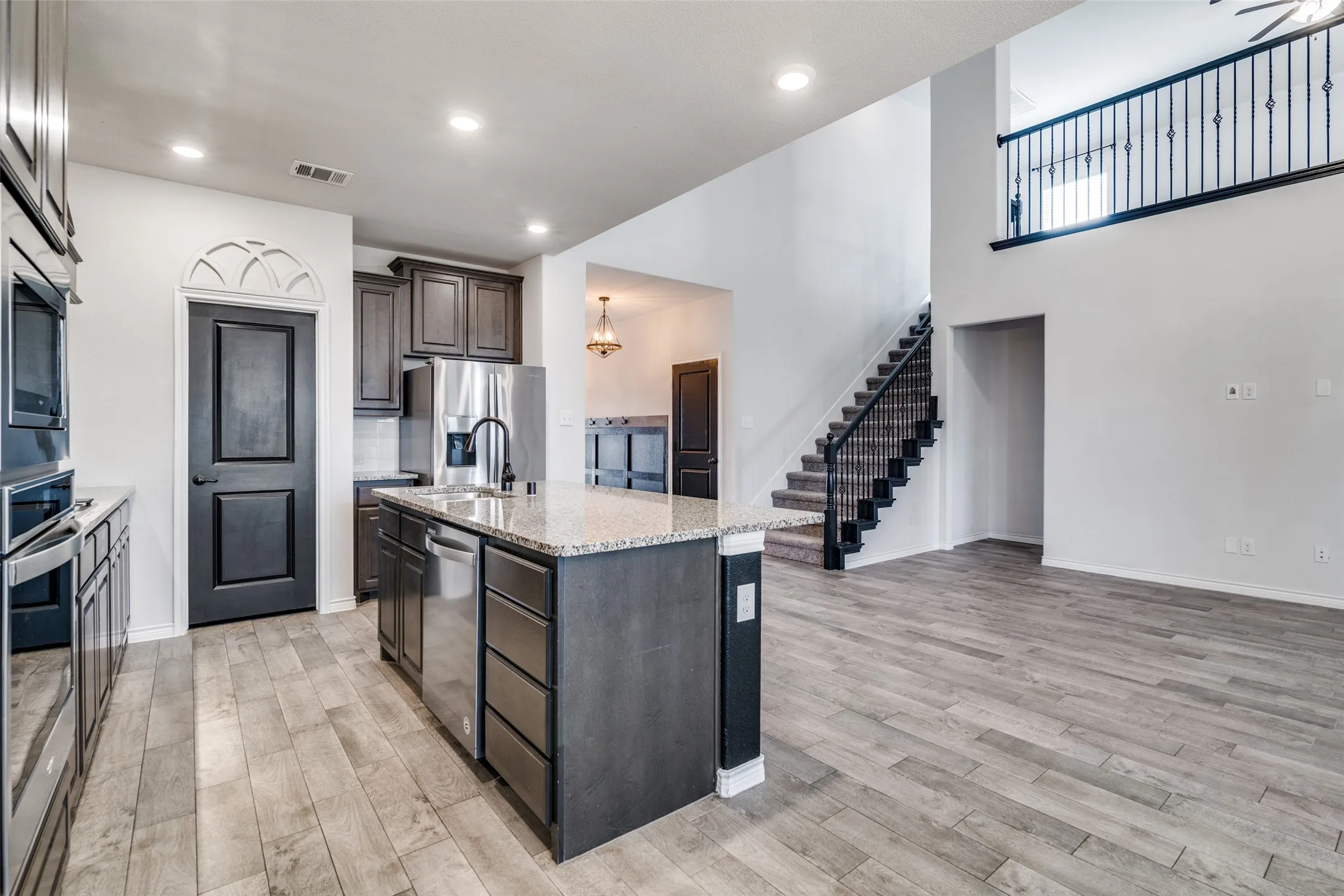 Open floor plan with views of gameroom/flex space upstairs