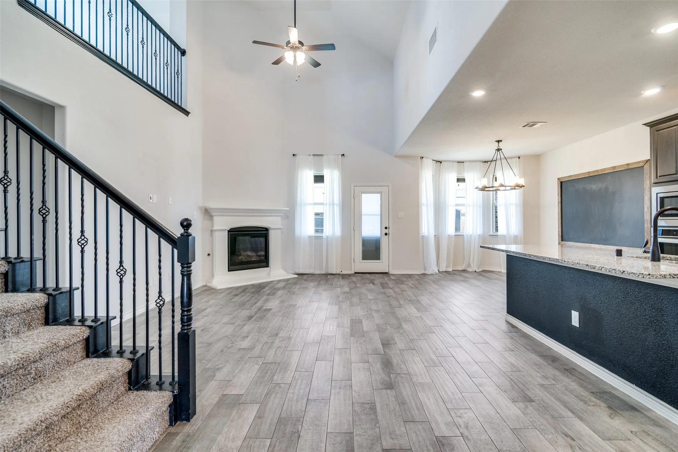 Open to kitchen and dining area