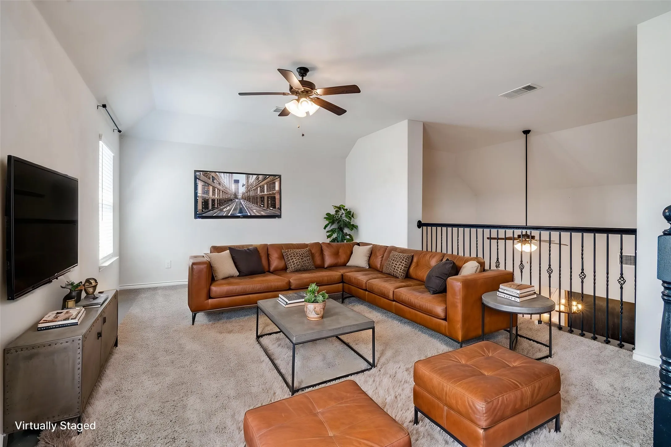 Upstairs you enter to the oversized game room or second living area