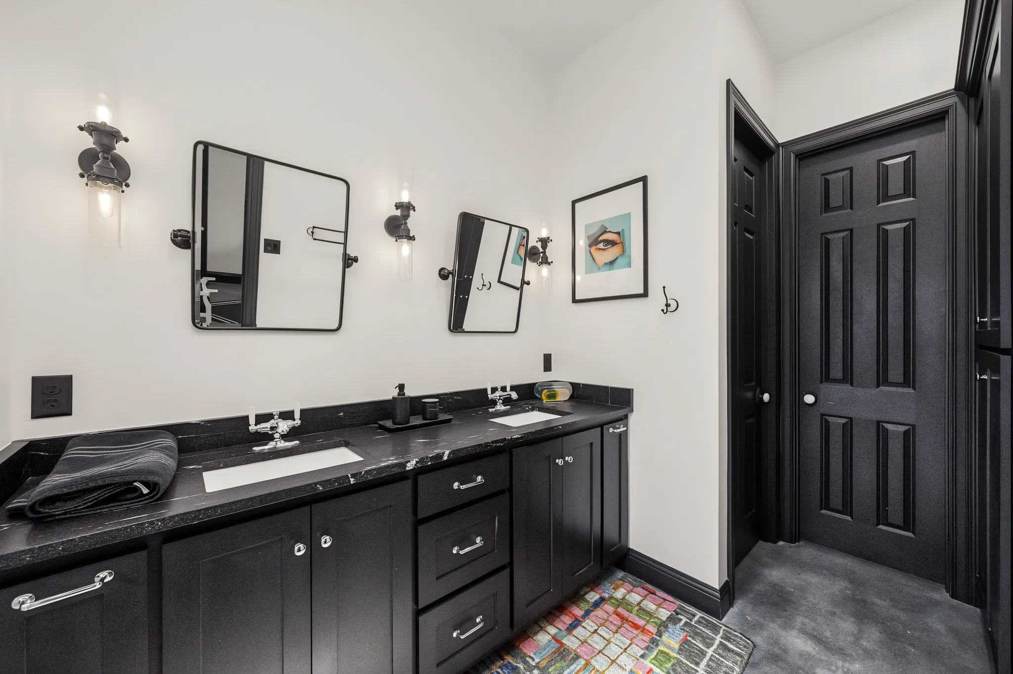Downstairs primary bathroom. With additional storage space and storm room.