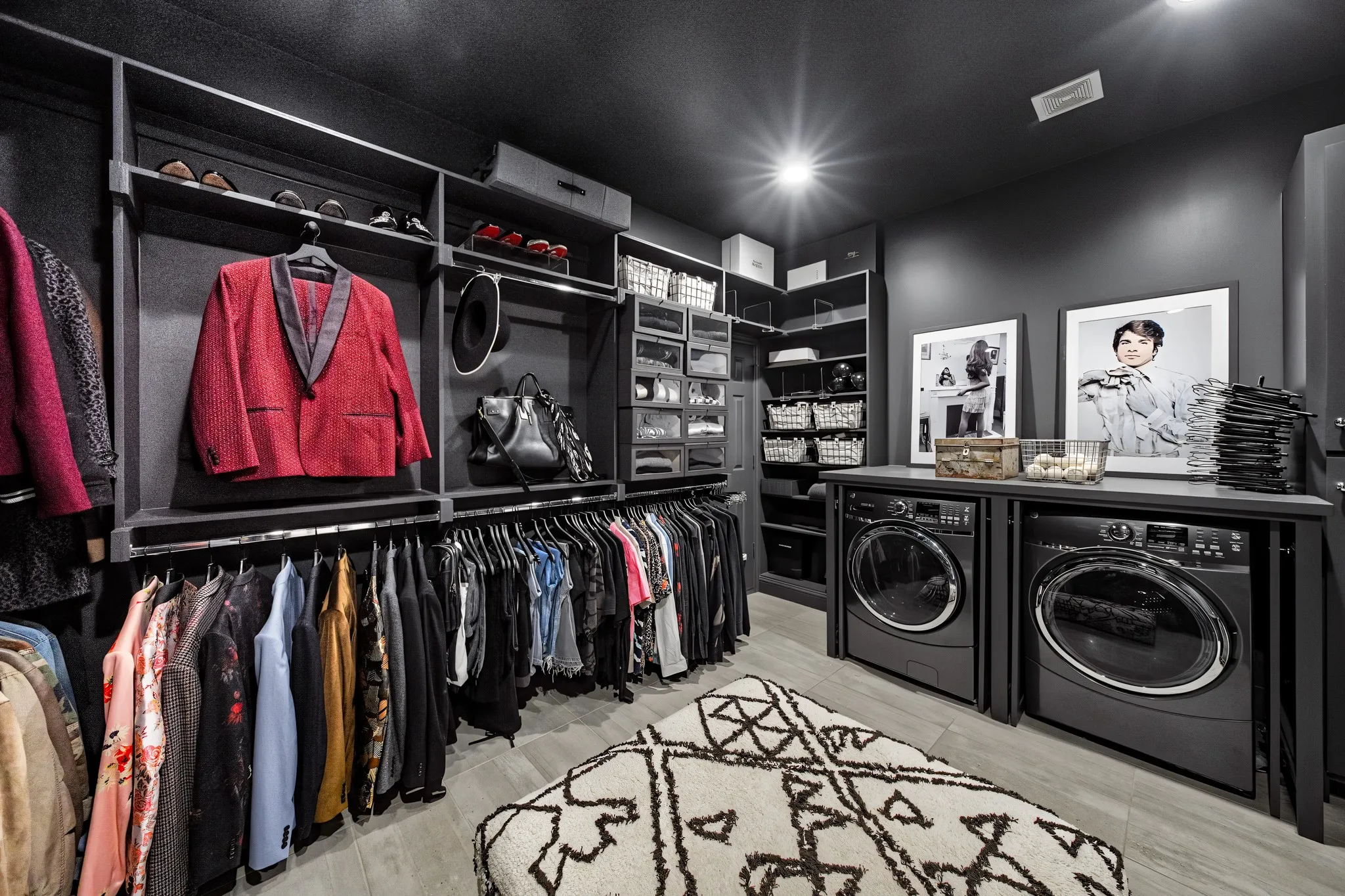 Upstairs primary walk in closet with utility area.