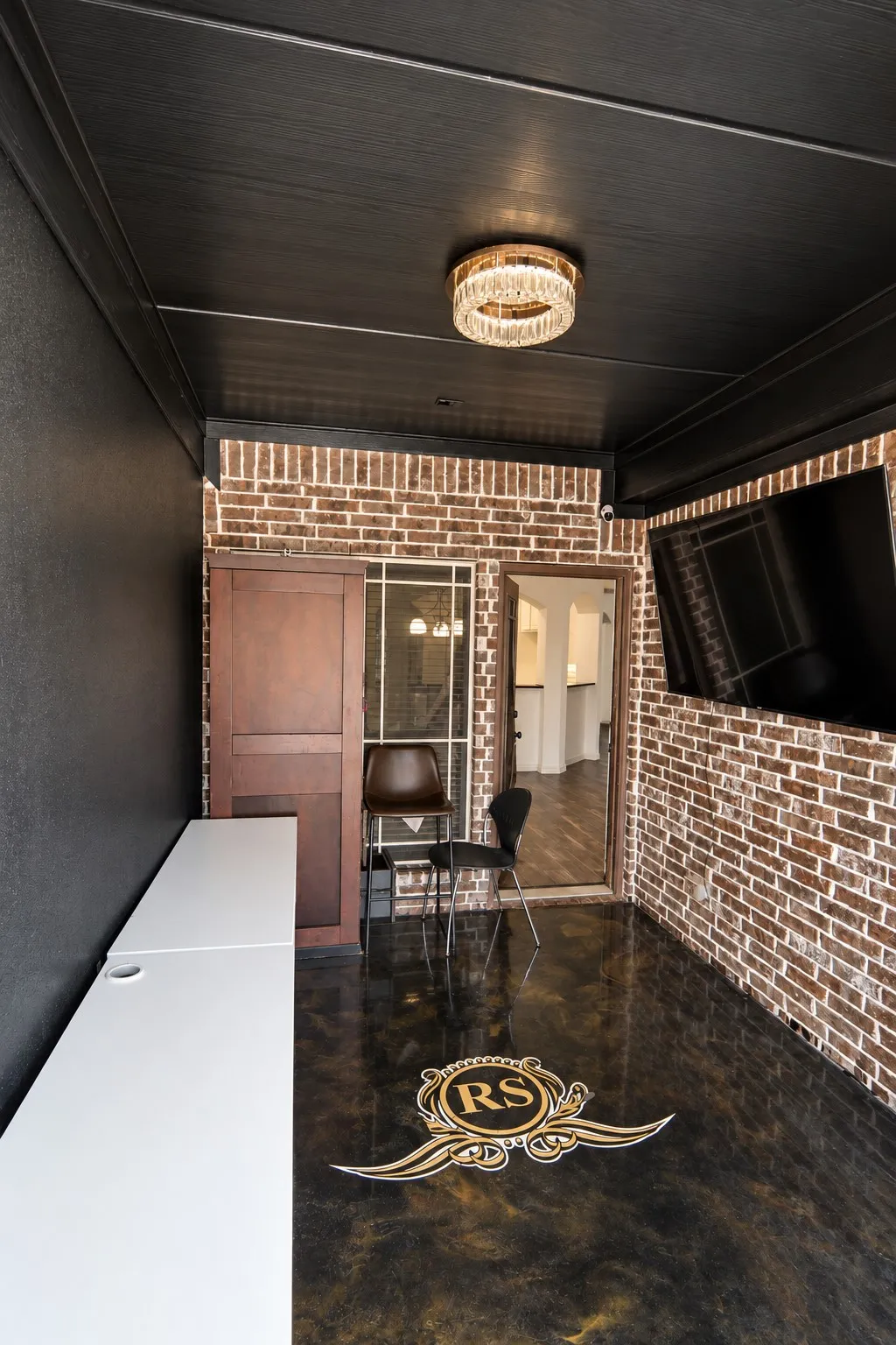 Fully Enclosed Sunroom/Pool Room. Emblem in floor will be removed prior to closing.
