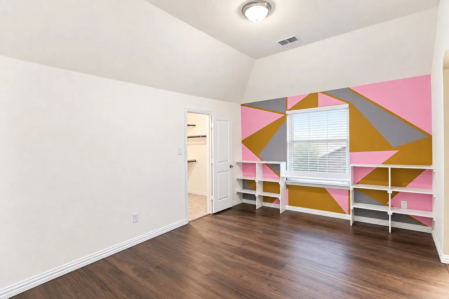 Custom painted wall that can be painted white upon closing.