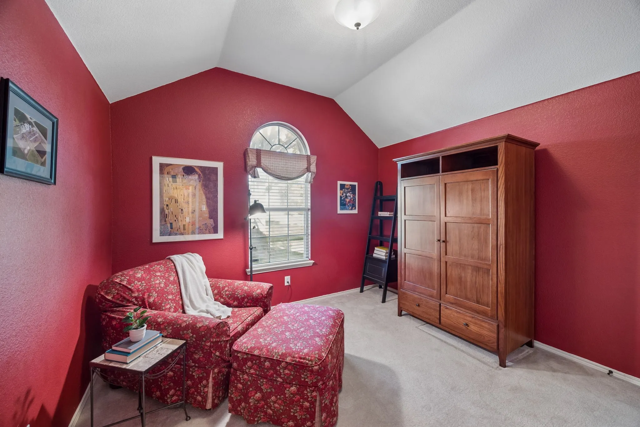 Currently enjoyed as a reading room, this space functions as a true secondary bedroom.