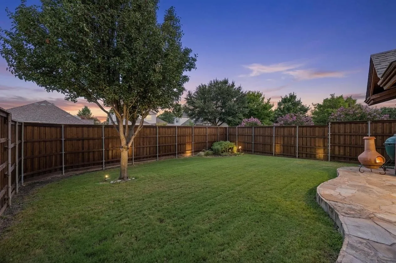 The covered patio extends the home’s living space into the backyard.