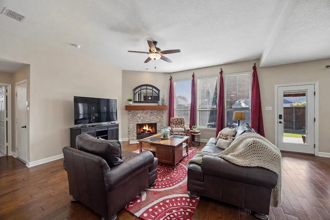 Tall ceilings and natural light give the main family room an open, comfortable feel.