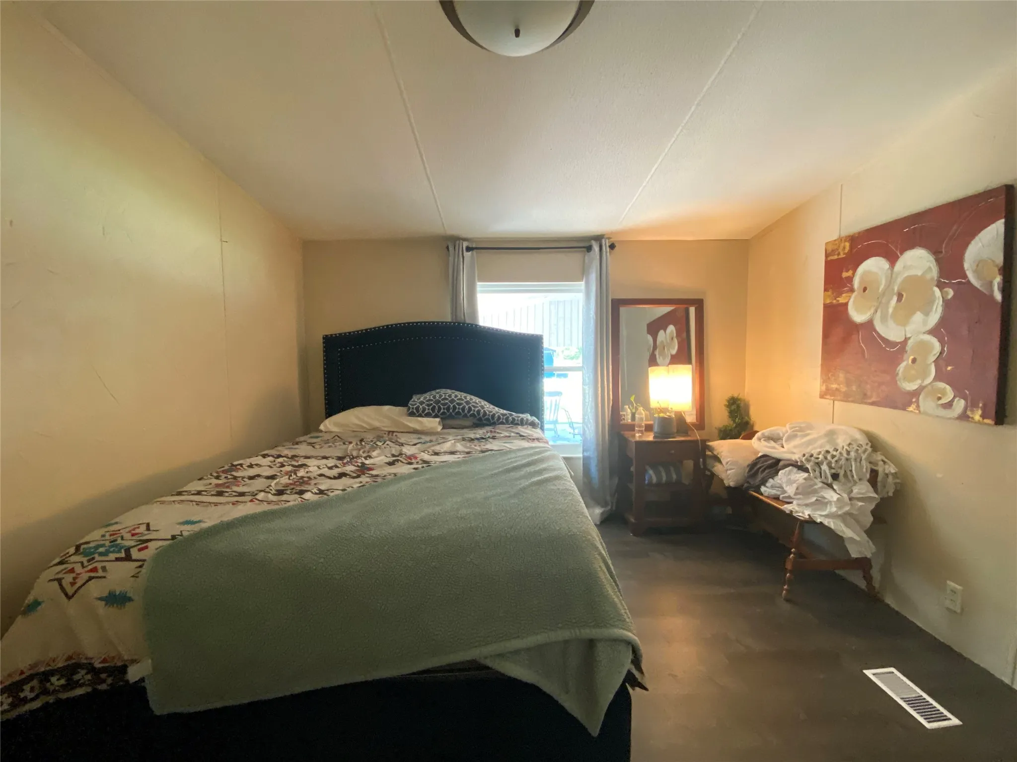Bedroom with dark wood-type flooring
