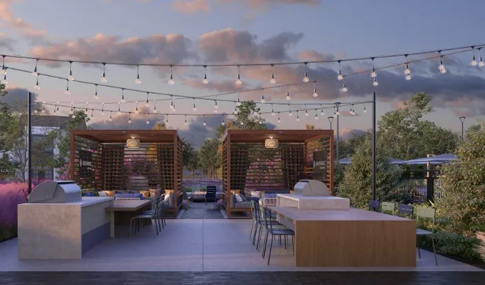 Patio terrace at dusk with an outdoor living space, a patio area, and area for grilling