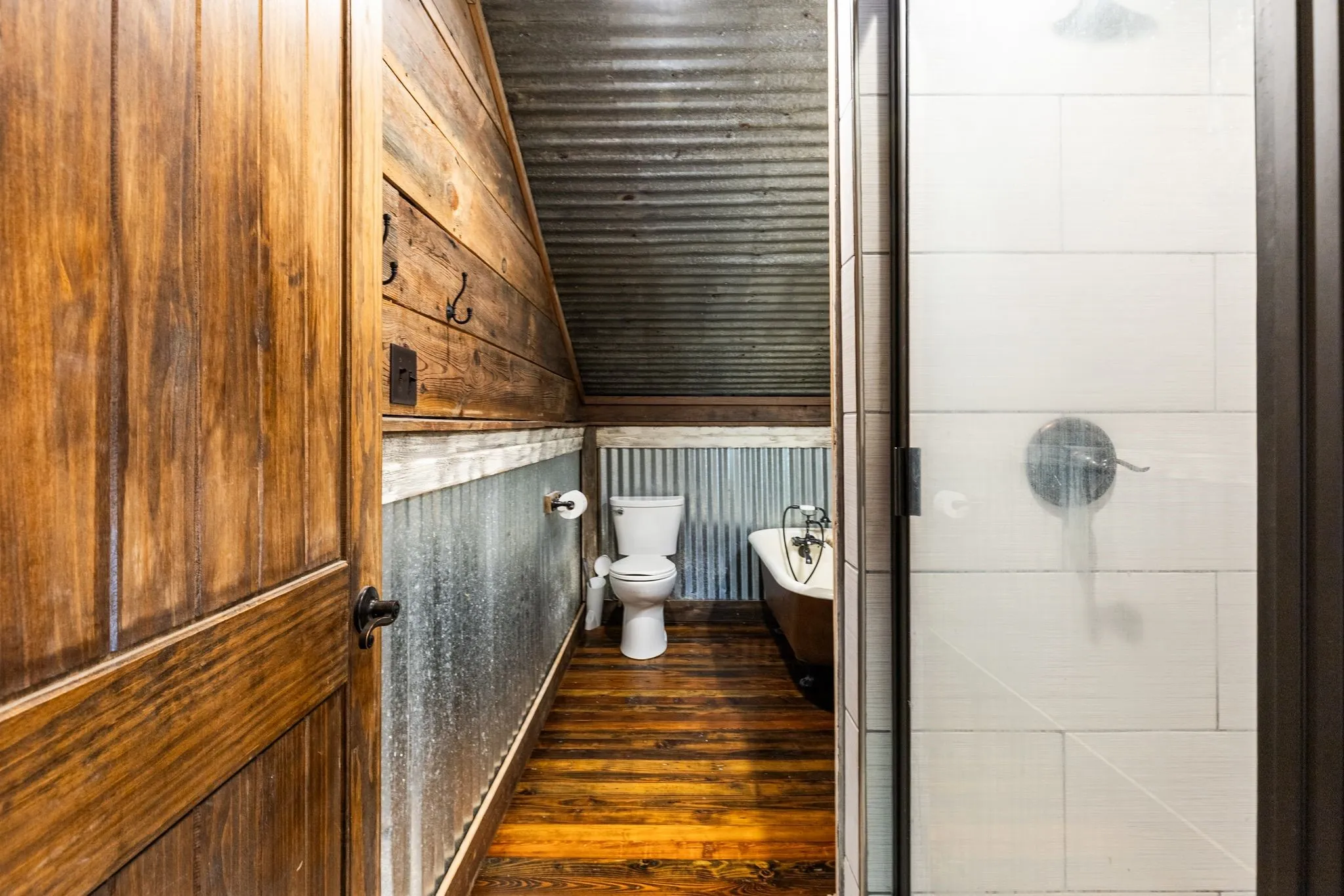 Full bath with shower and claw foot tub on the second floor.