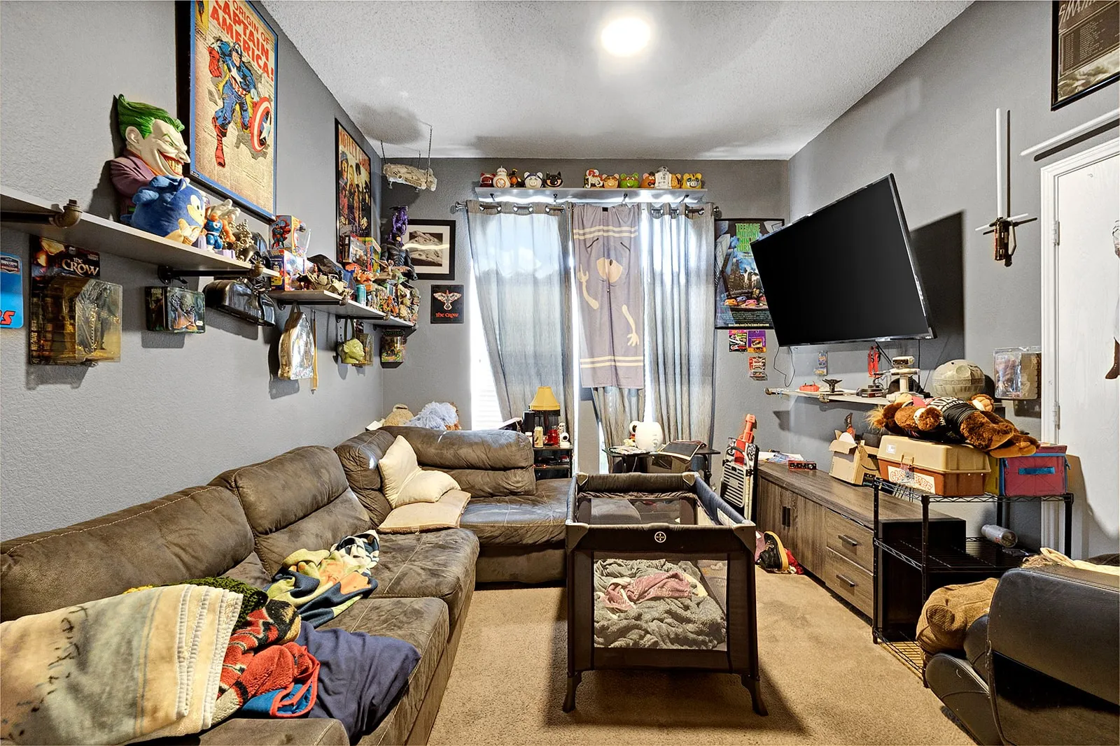 Room featuring carpet flooring and light grey walls