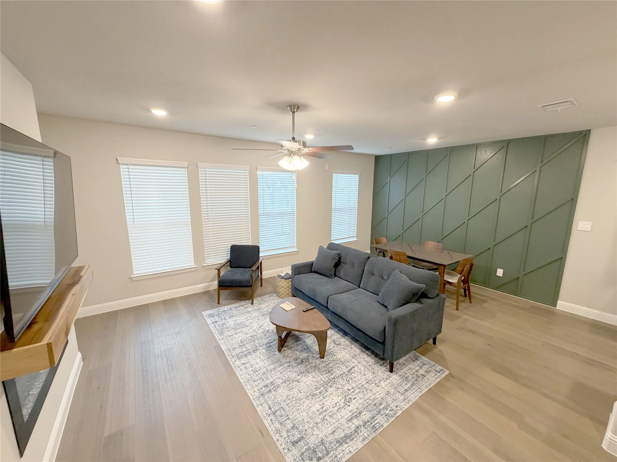 75-inch tv, sofa, 4 chair dining
