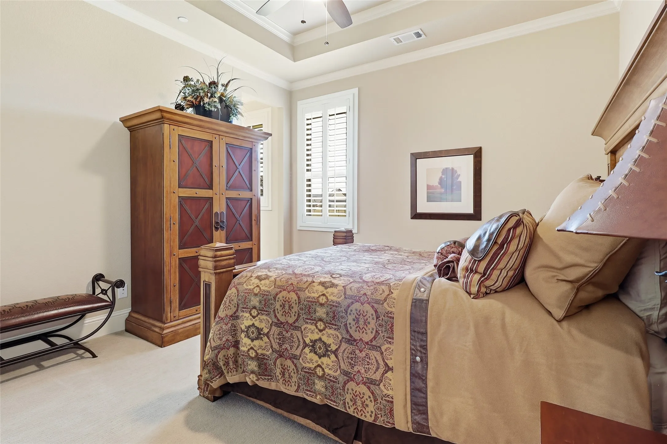 Secluded secondary bedroom overlooks backyard.