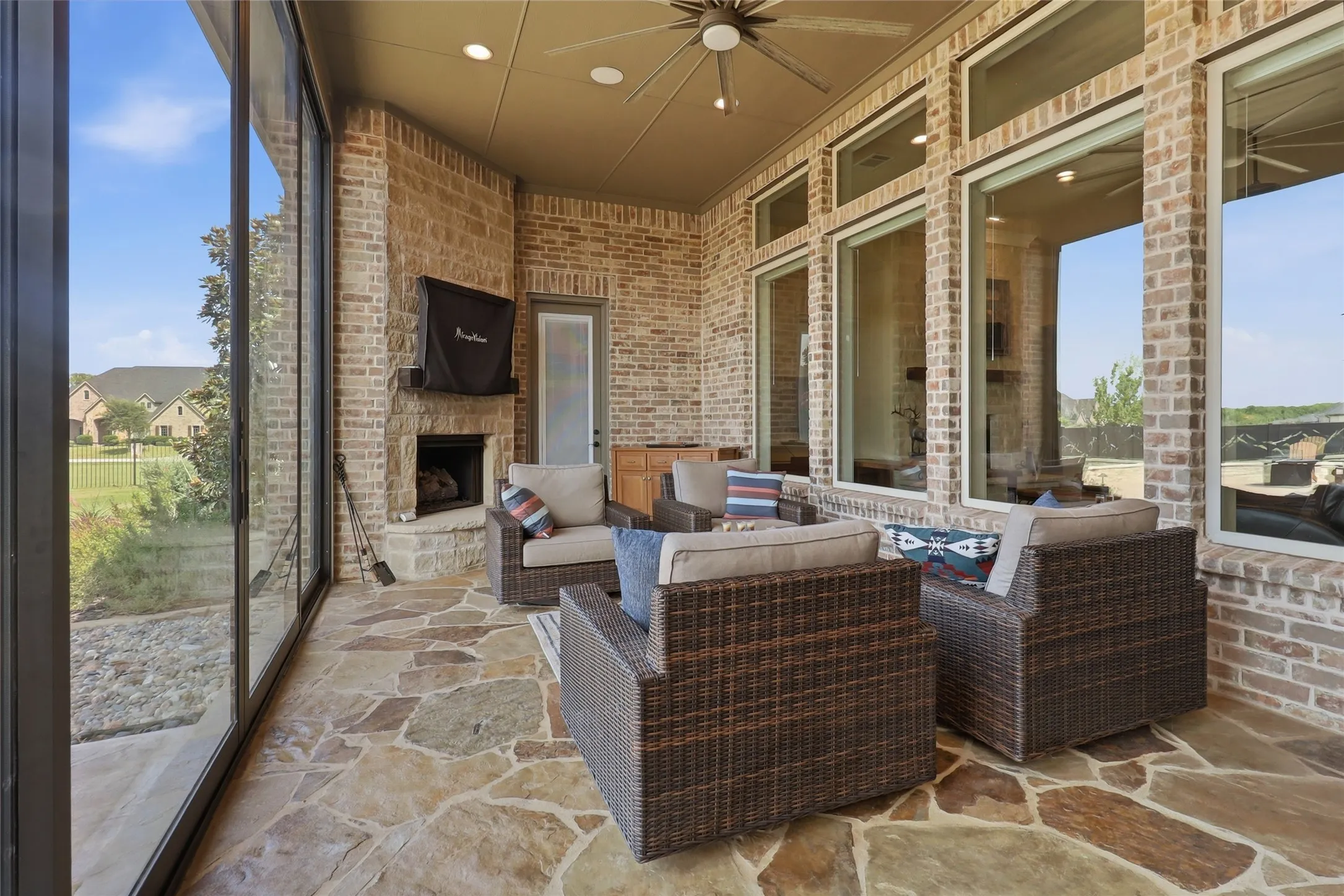 Such a perfect room for morning coffee or watching sports while enjoying the cozy fireplace.