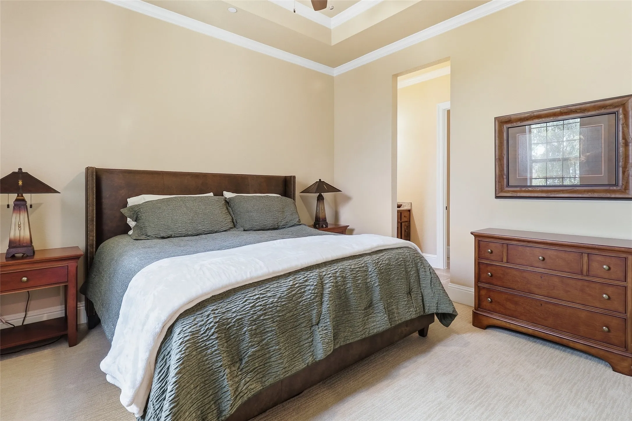 Secondary bedroom overlooks front of home and shares a "Jack n' Jill" bathroom.