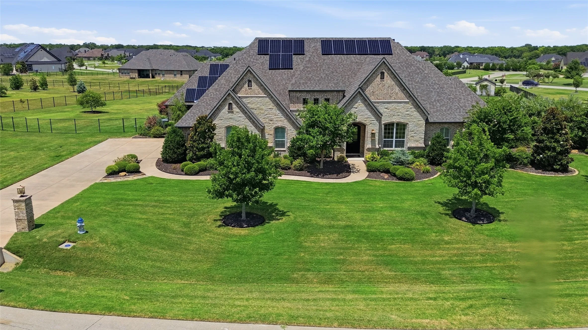 Stunning custom-built single story home on 1.85 acres offers the perfect balance of refined living and wide open space.