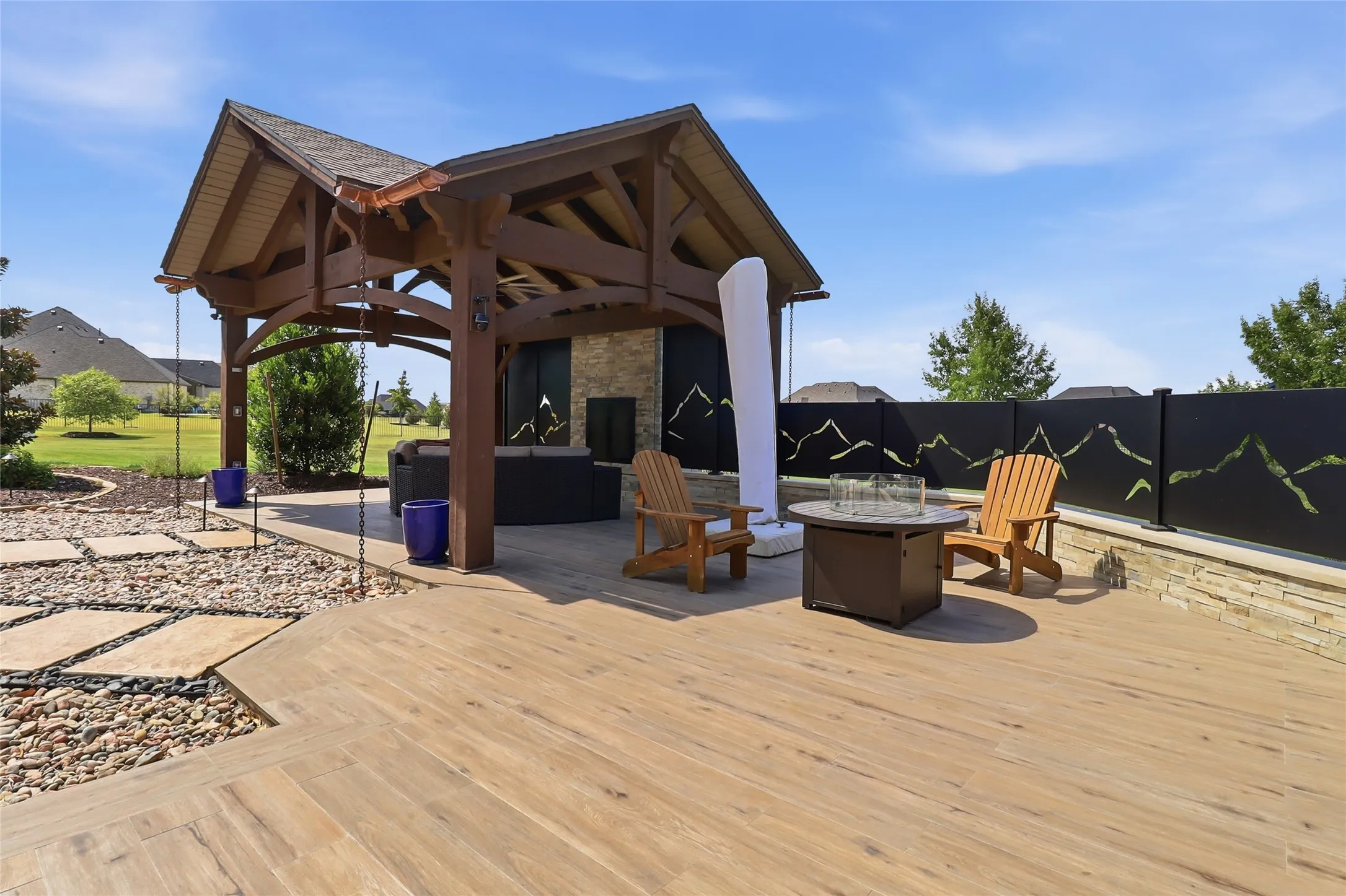 Imagine making memories with friends and family in this 1.85 acre gorgeous home with its amazing number of upgrades and thoughtfully-chosen design features!