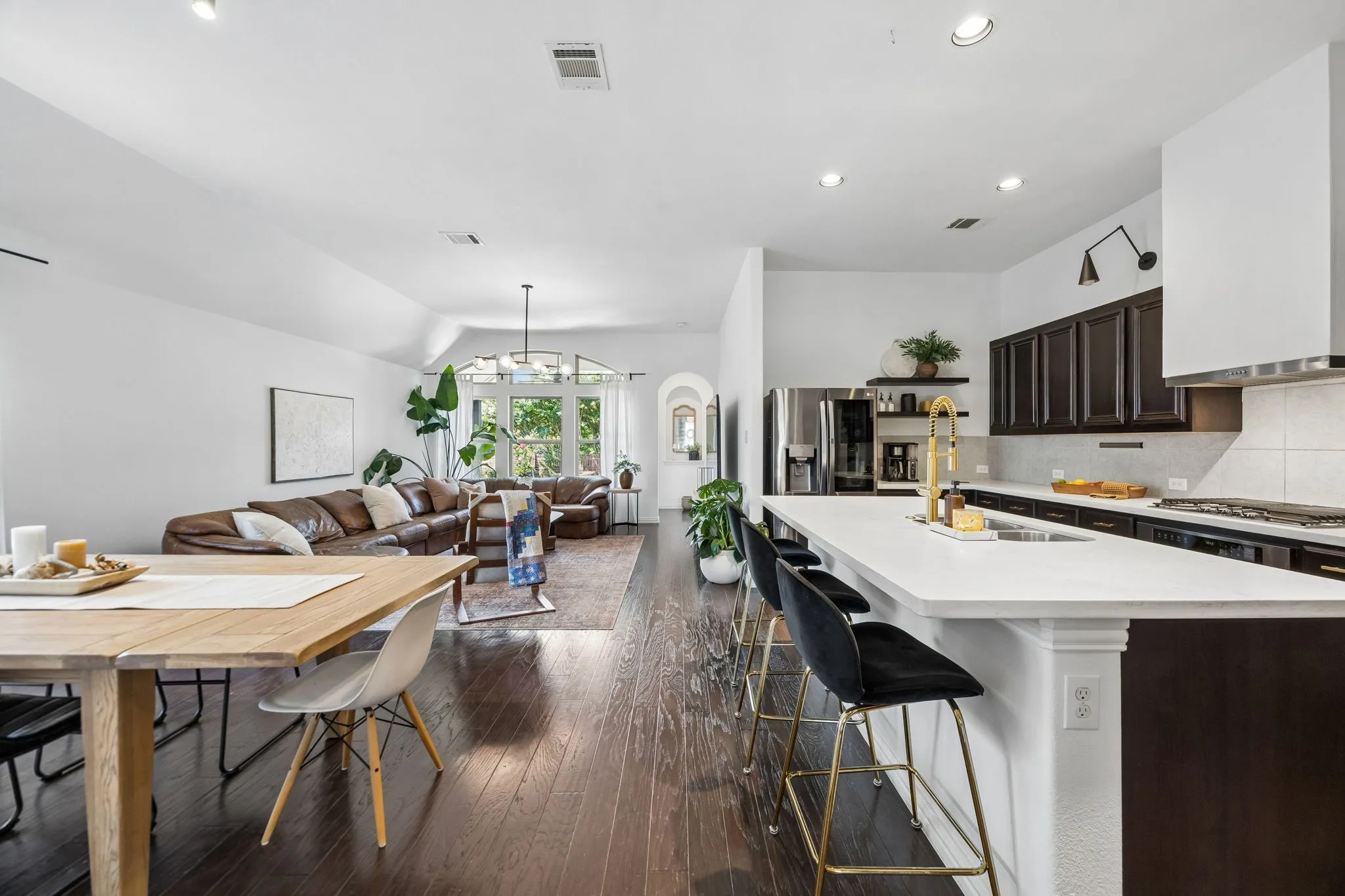 Open concept living space with ample room for gathering and an easy floor kitchen with tons of storage