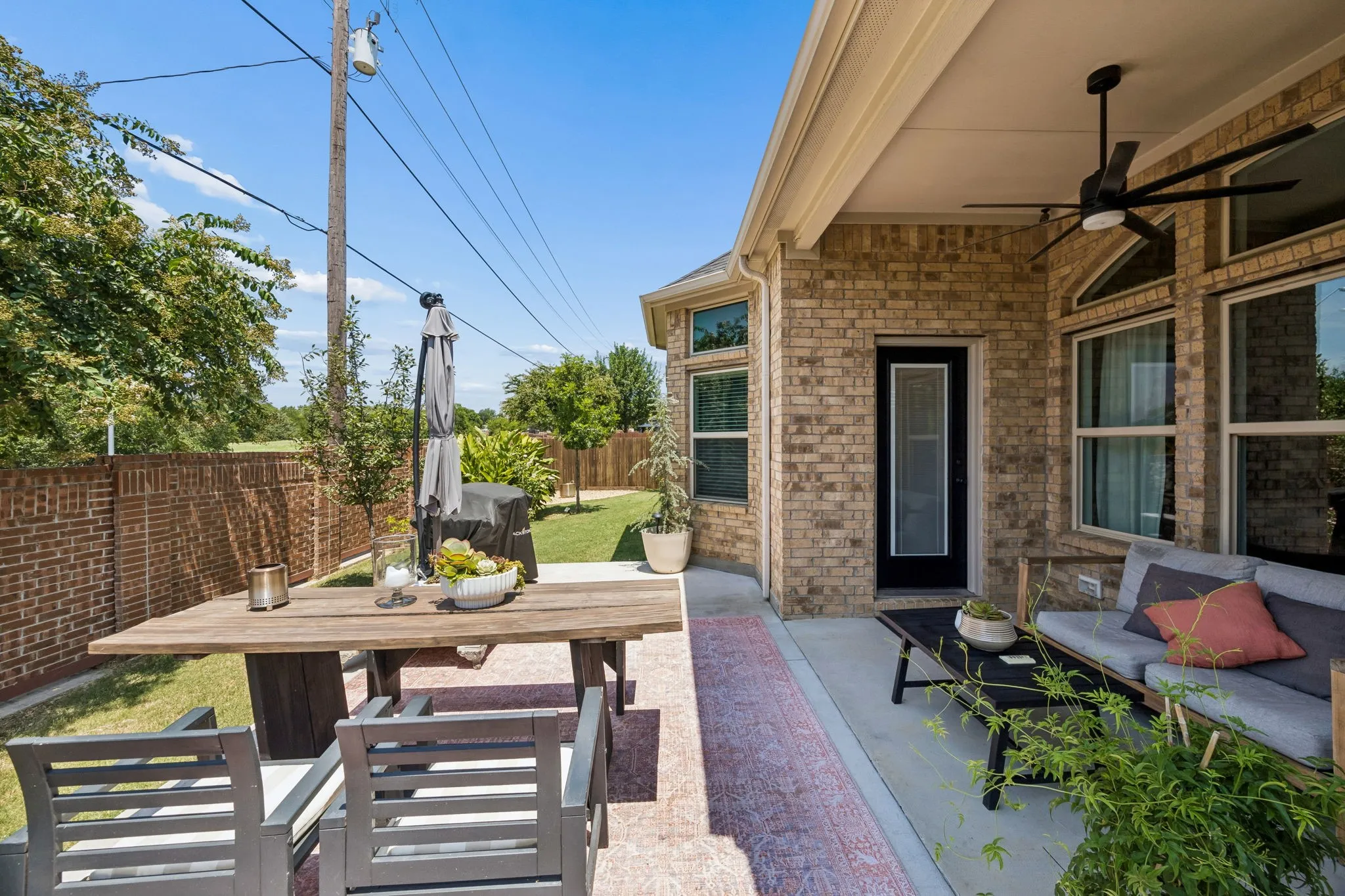 Extended Patio with lush landscaping