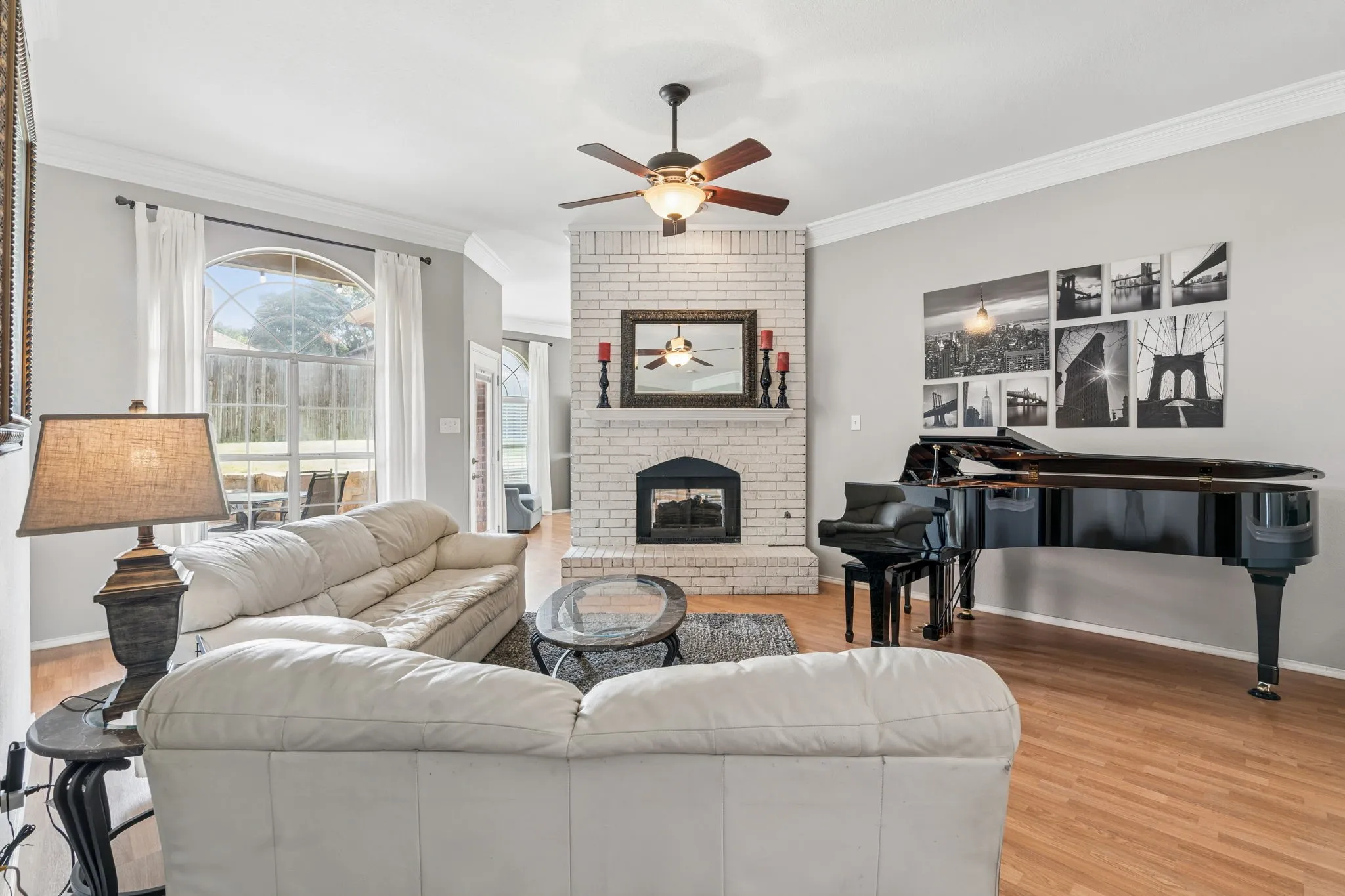 Relaxing living room with brick fireplace.