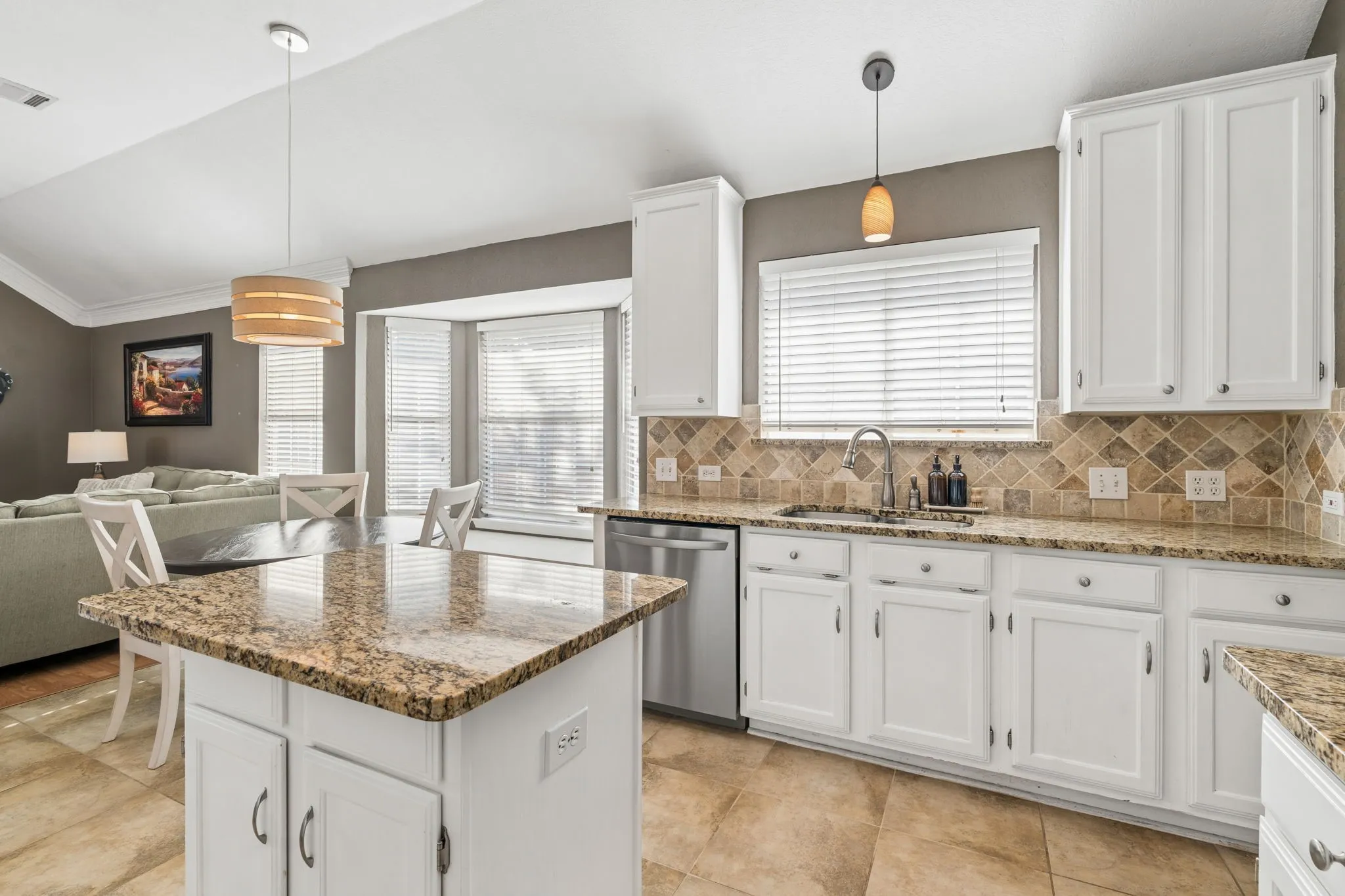 Coordinating backsplash and countertops.