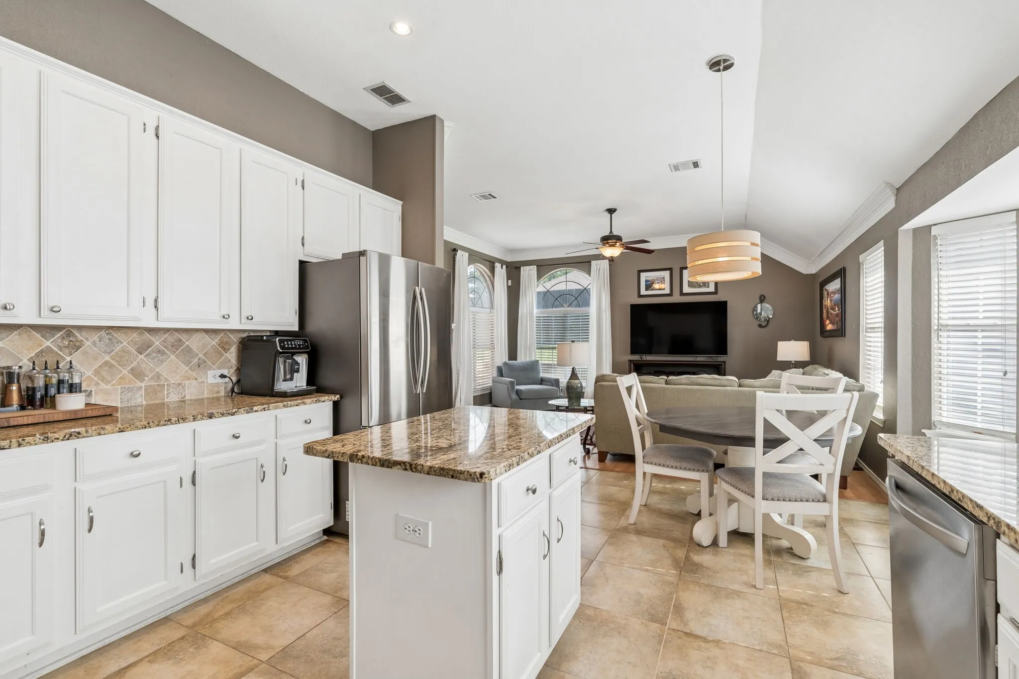 Compact kitchen island with additional room for storage.