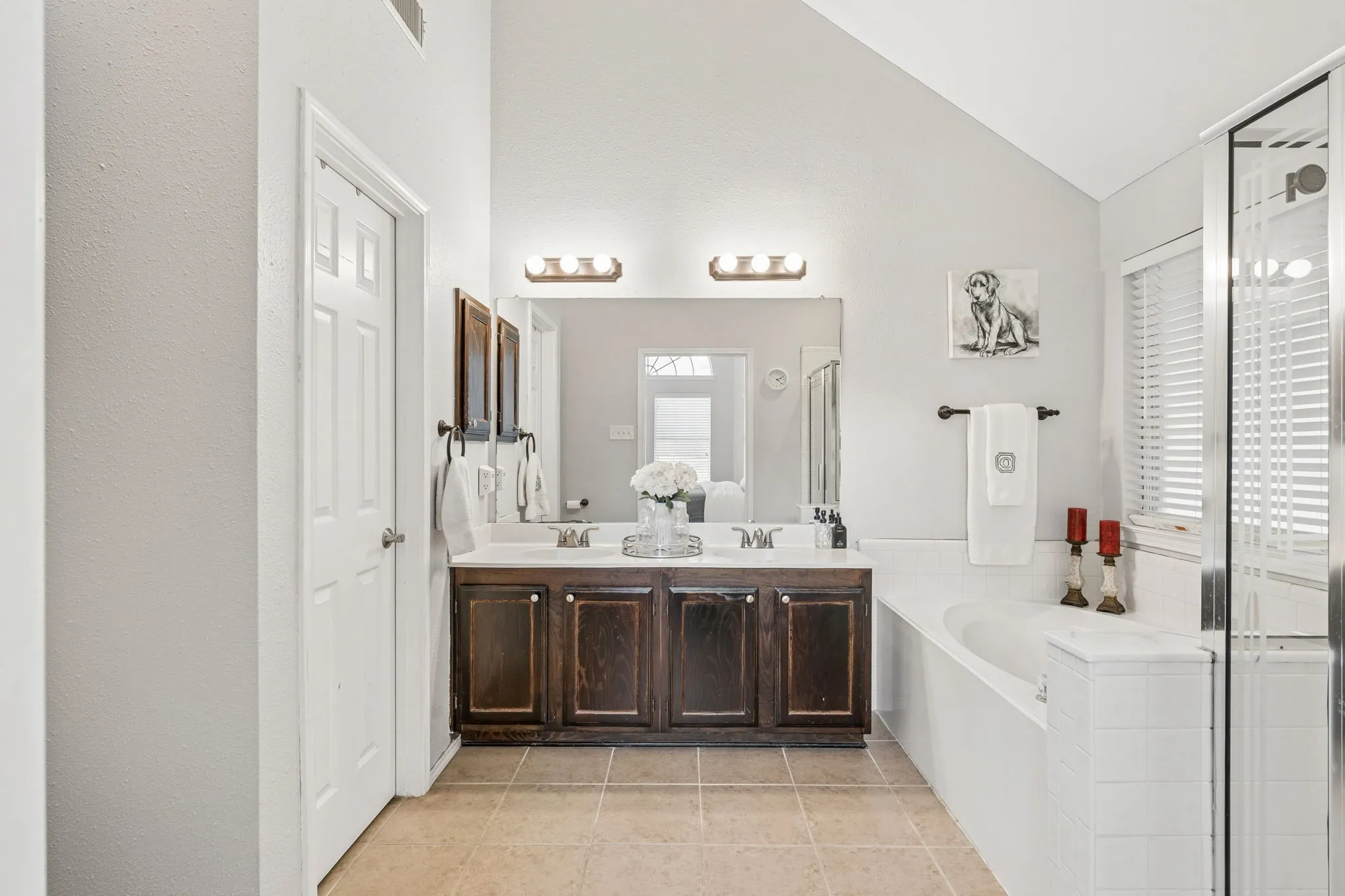 Dual sinks and separate tub.