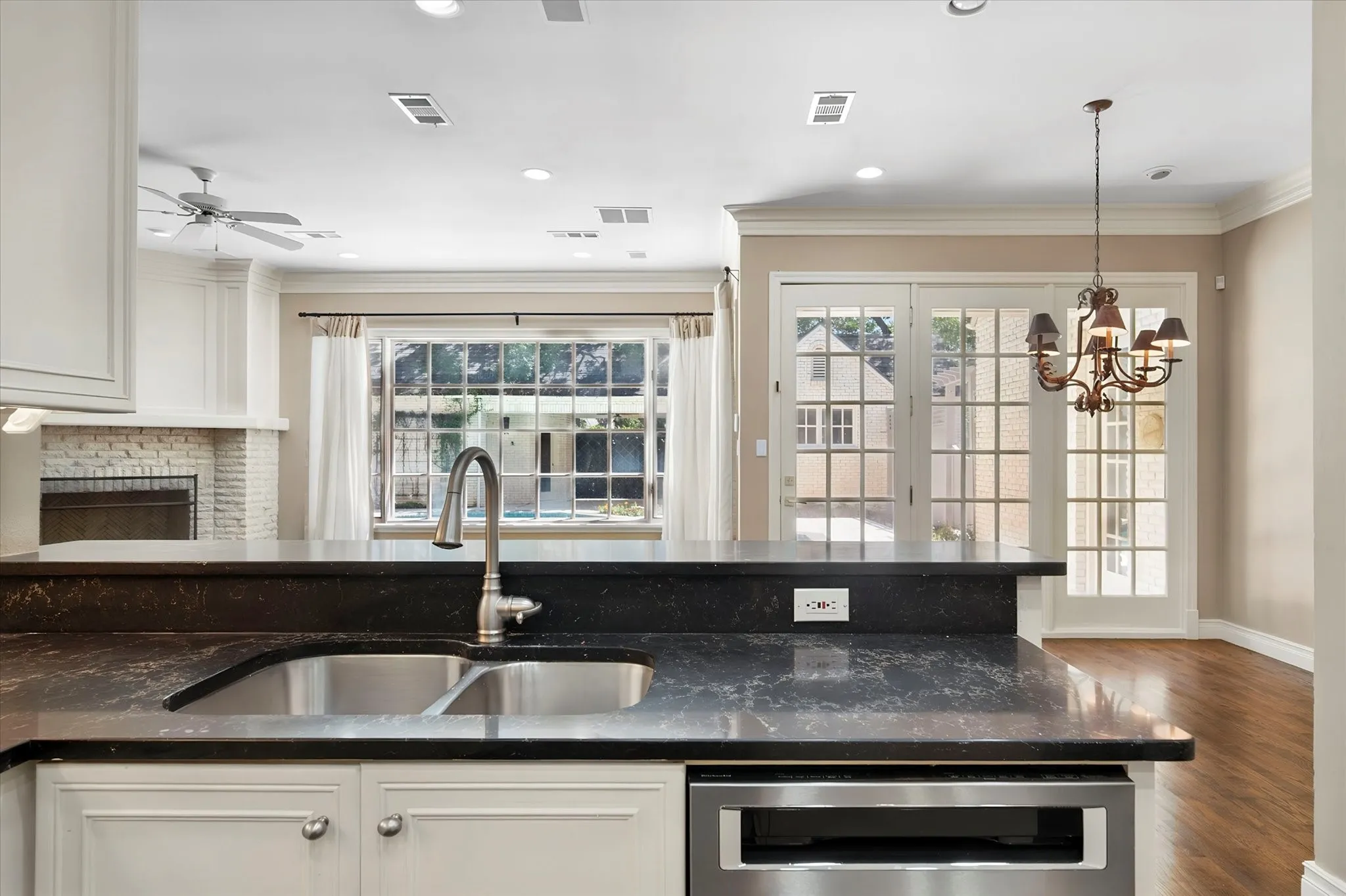 The open kitchen has views of the backyard.
