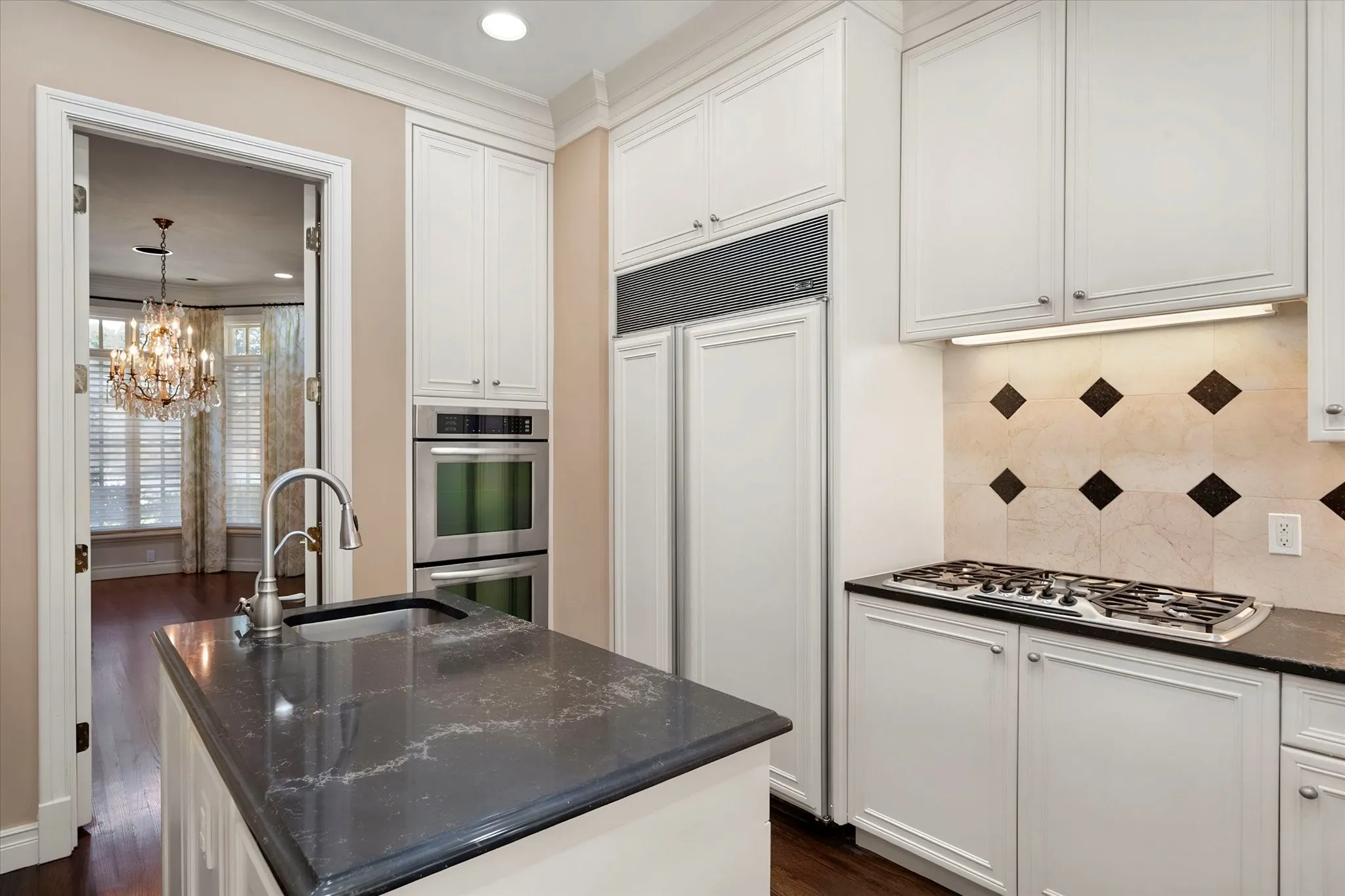 Granite counter tops and tile backsplash