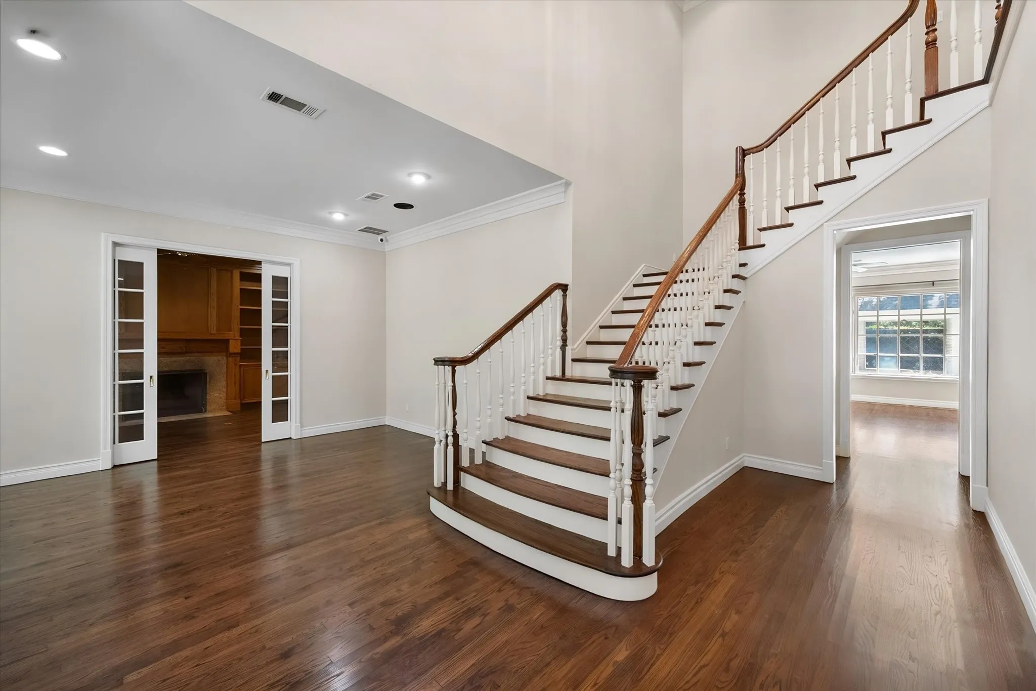 Primary stairway leads to 2 additional bedrooms and 4th living area.
