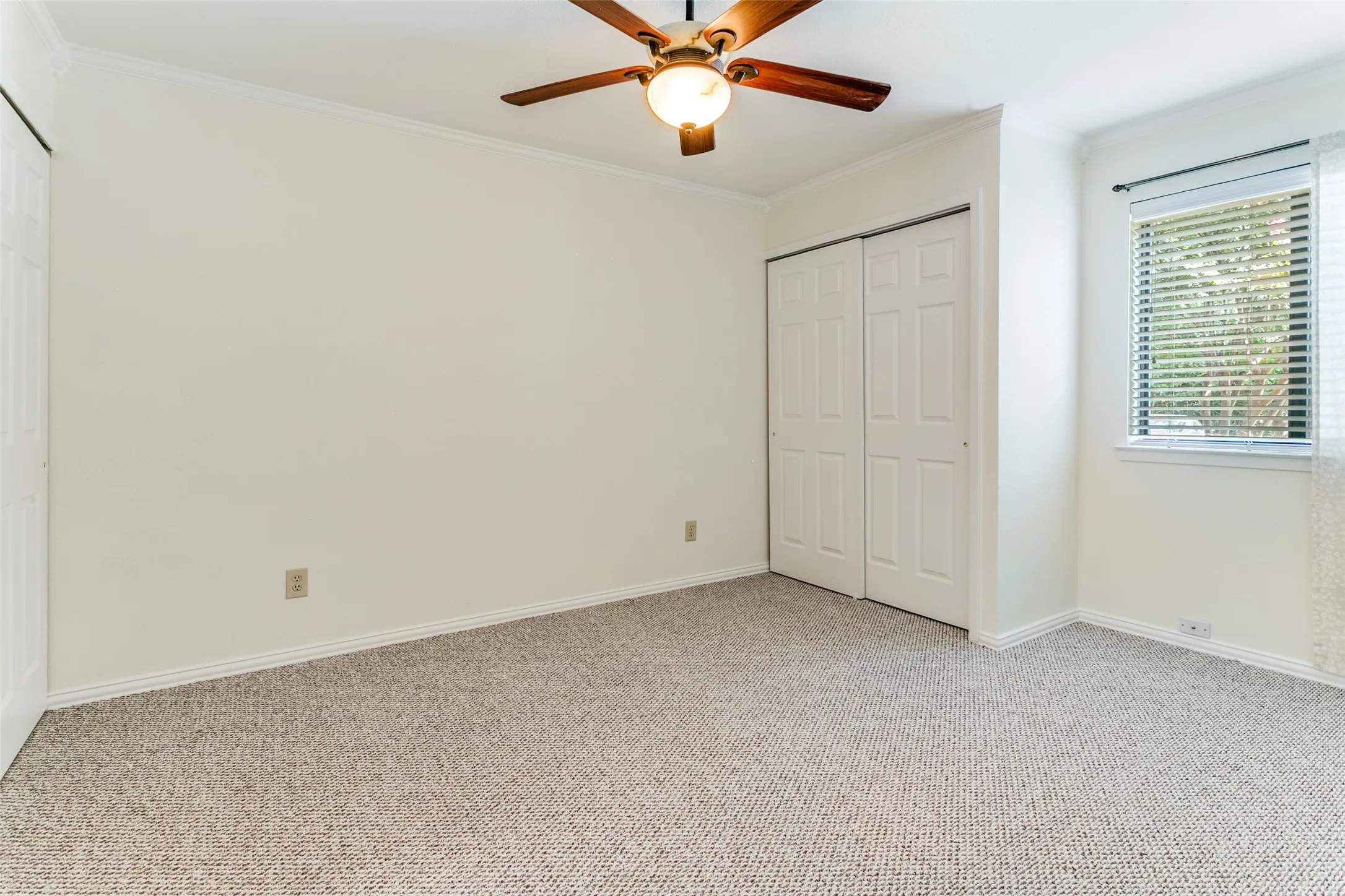 The primary bedroom is located downstairs with its own ensuite bathroom.