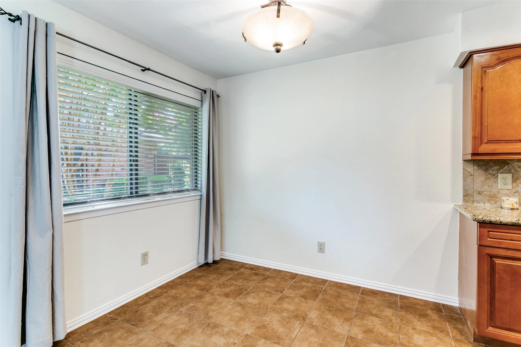 The dining area is conveniently located off ot the kitchen.