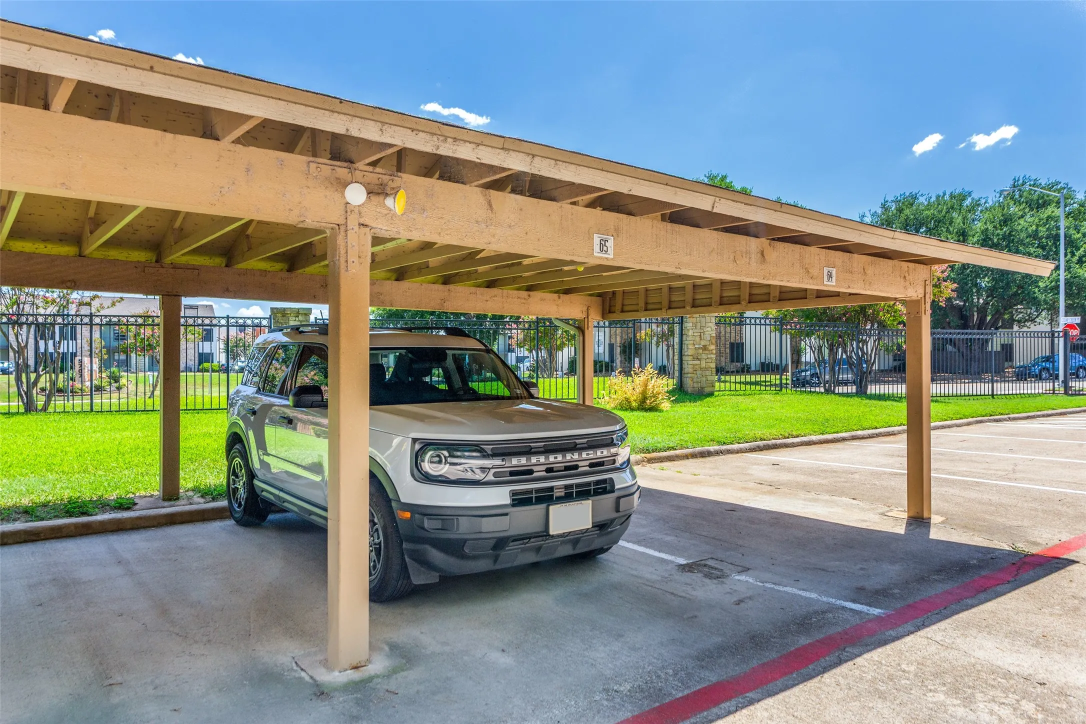 There is one assigned parking space, #65, and plenty of extra parking directly across for a second car or guests.