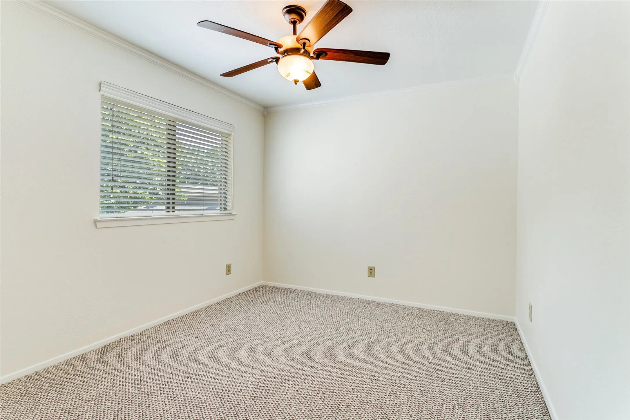 one of the two secondary bedrooms which are located upstairs.