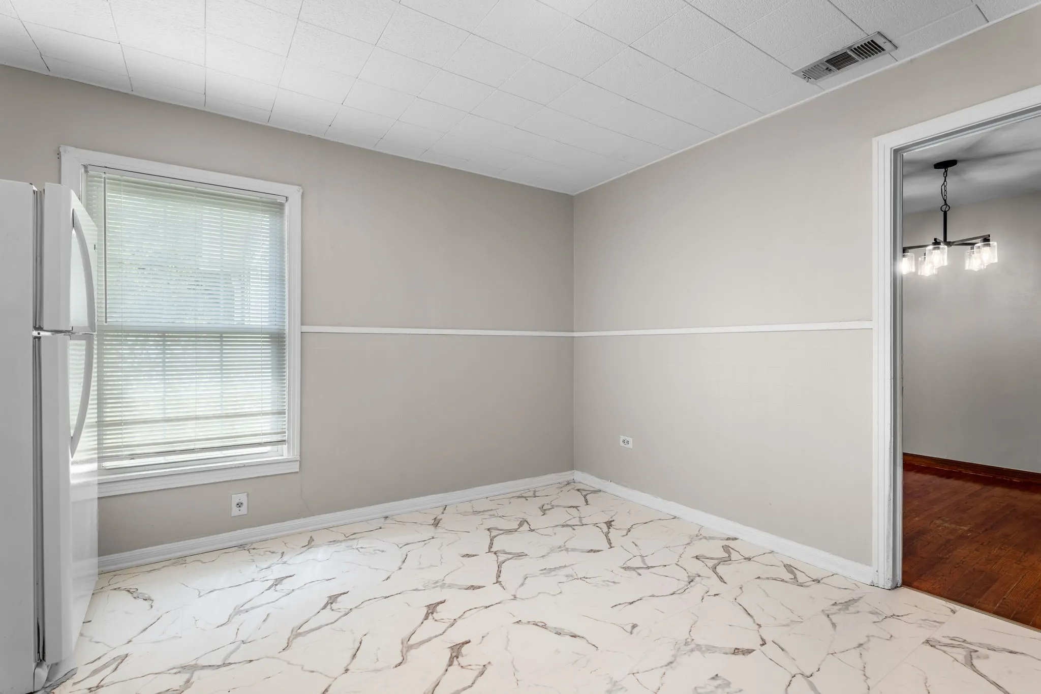 Breakfast Area with new vinyl tile flooring