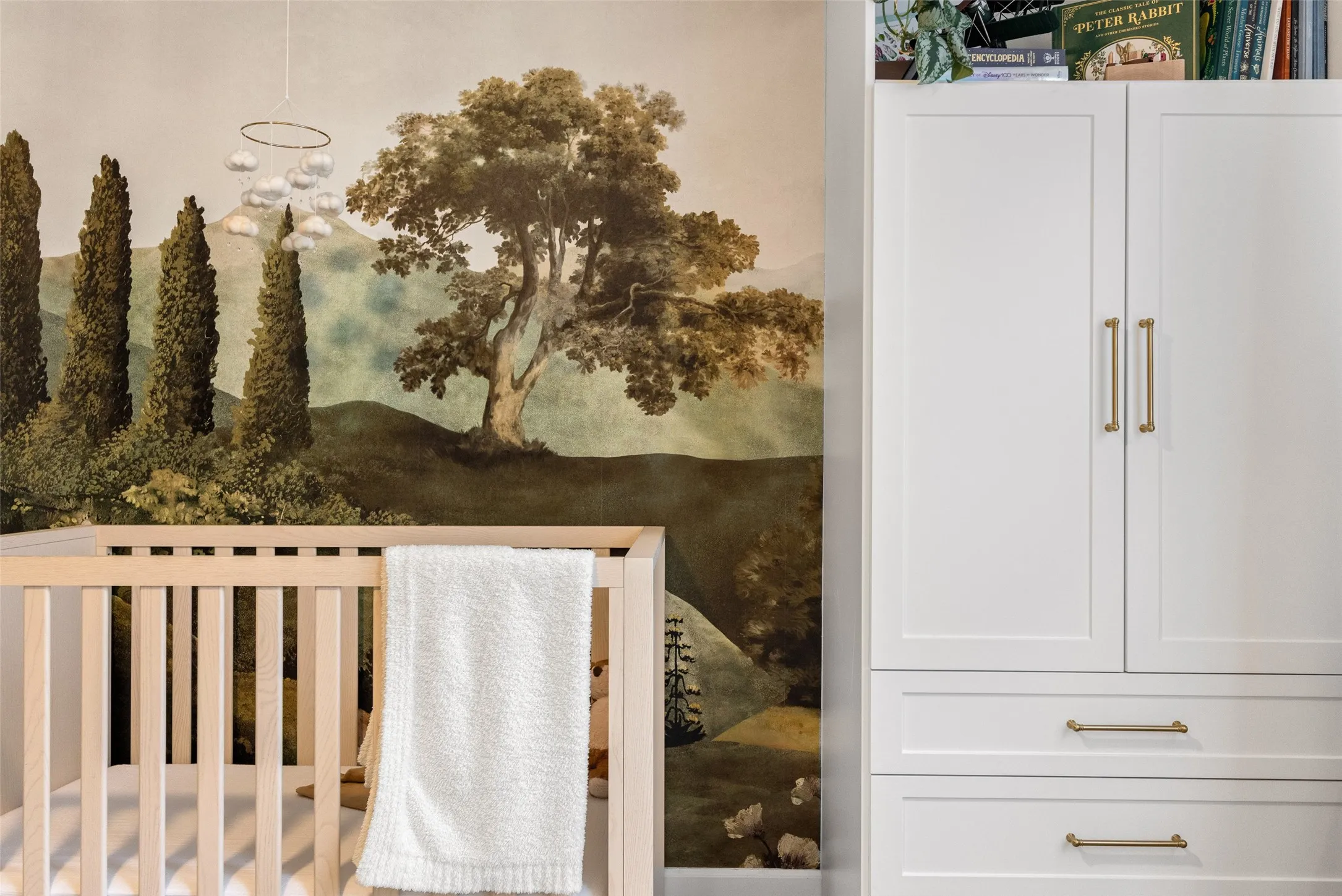 This unique bedroom stands out with incredible custom artwork hand-painted on the wall, adding a personal and creative touch