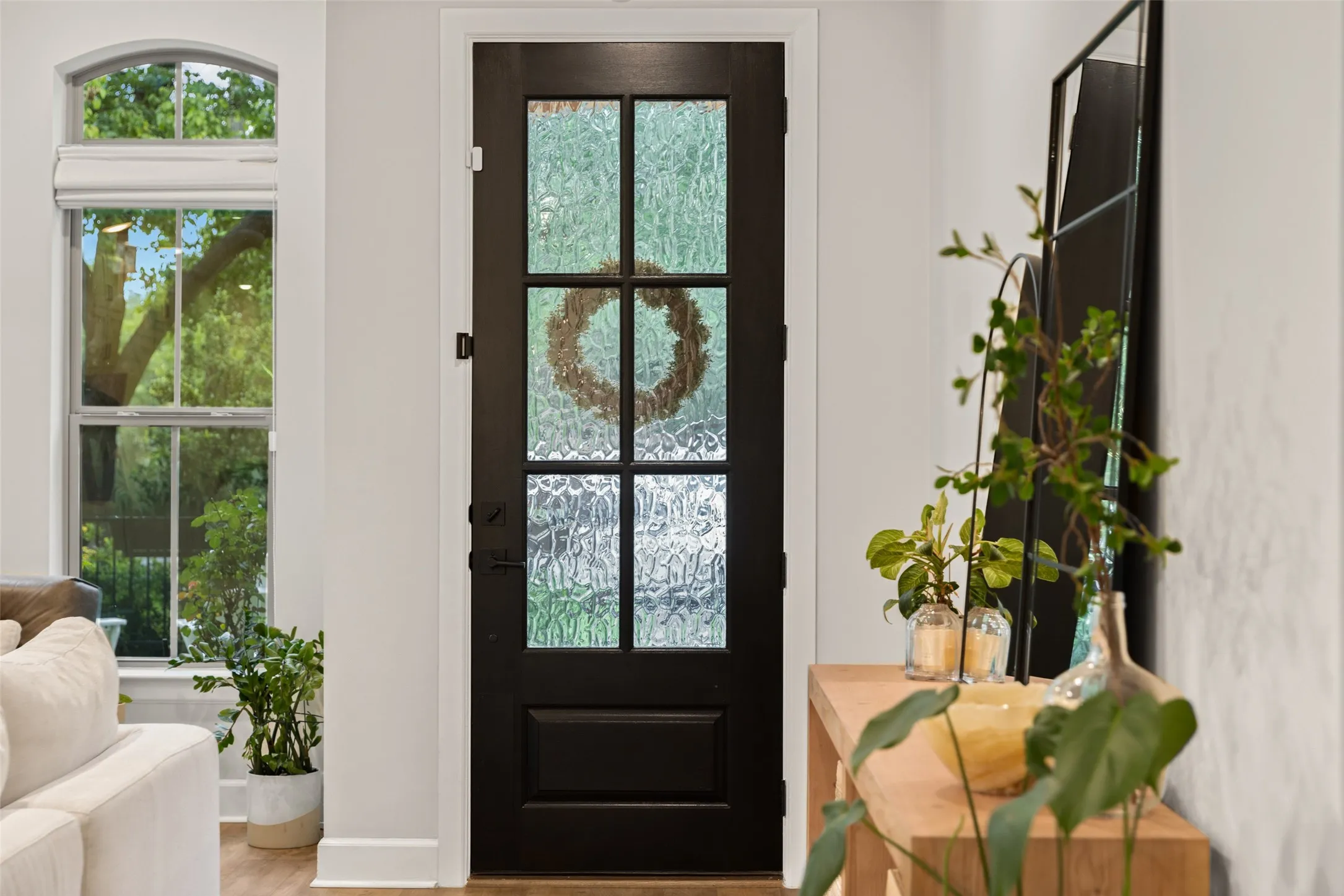 The beautiful doorway opens into a bright and inviting interior